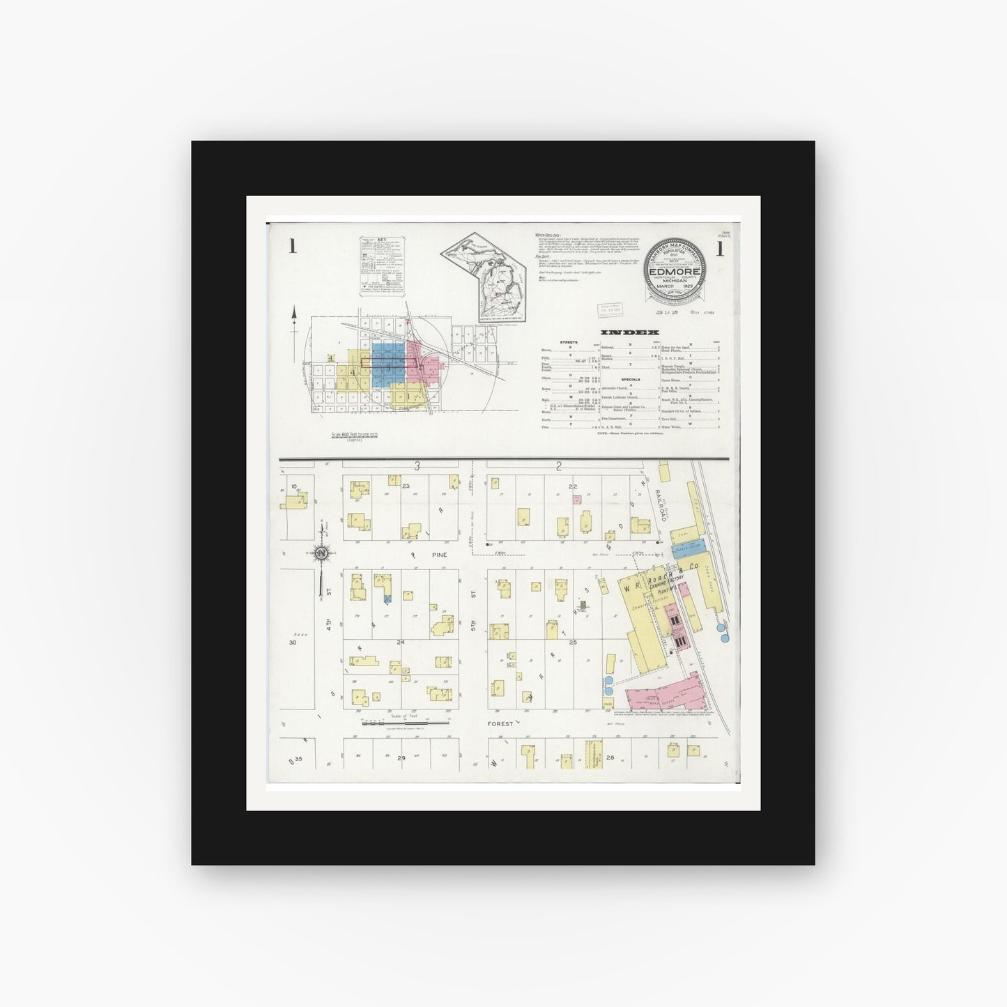 Old map wall art mockup — black gallery frame with white mat — Sanborn Fire Insurance Map from Edmore, Montcalm County, Michigan (1929), Sheet #0001