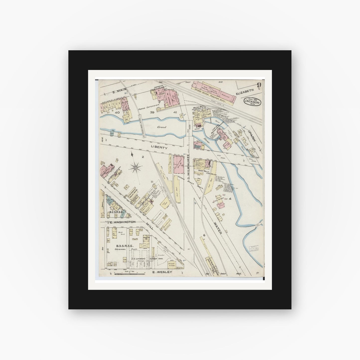 Old map wall art mockup — black gallery frame with white mat — Sanborn Fire Insurance Map from Jackson, Jackson County, Michigan (1886), Sheet #0009