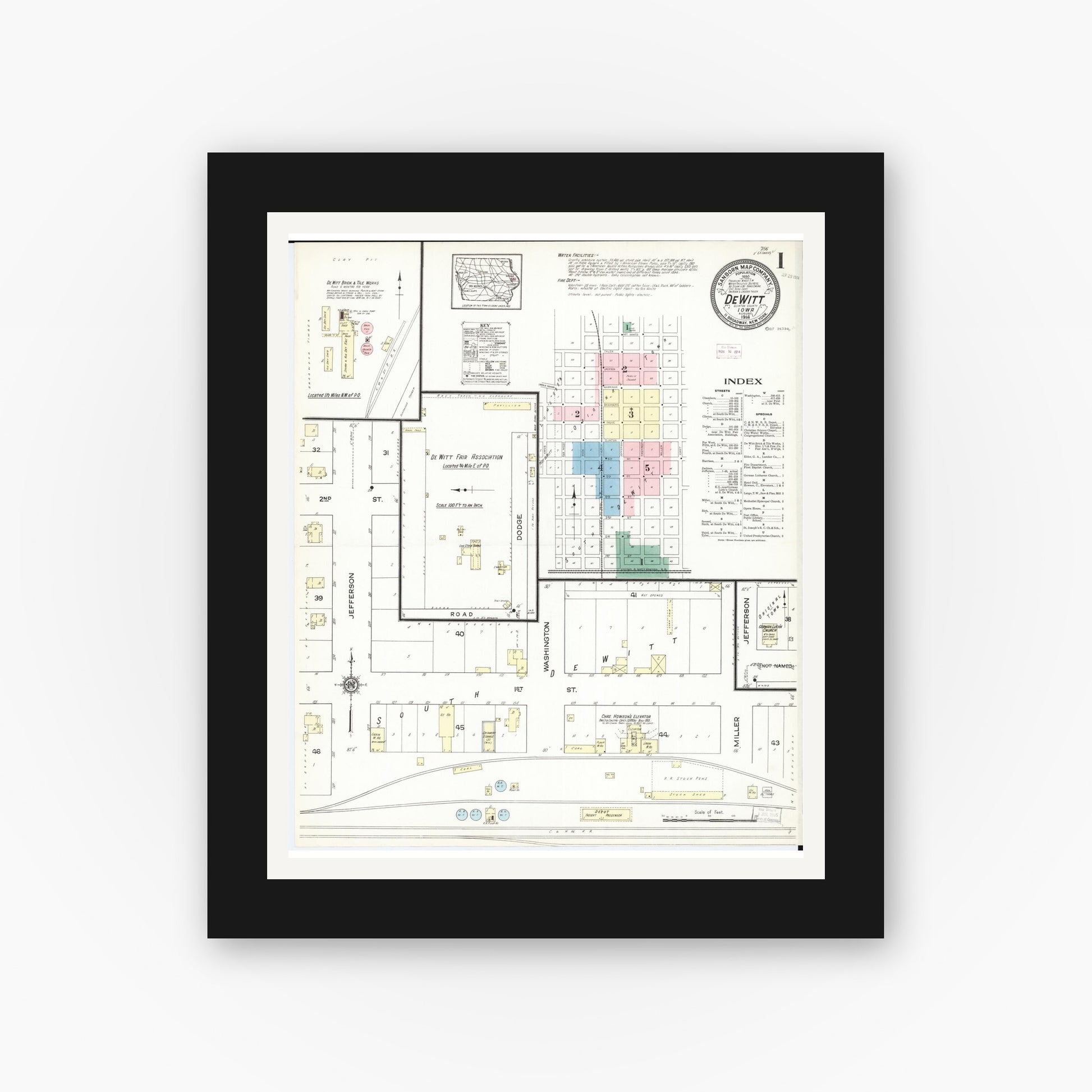 Old map wall art mockup — black gallery frame with white mat — Sanborn Fire Insurance Map from De Witt, Clinton County, Iowa (1914) â€” Complete Set