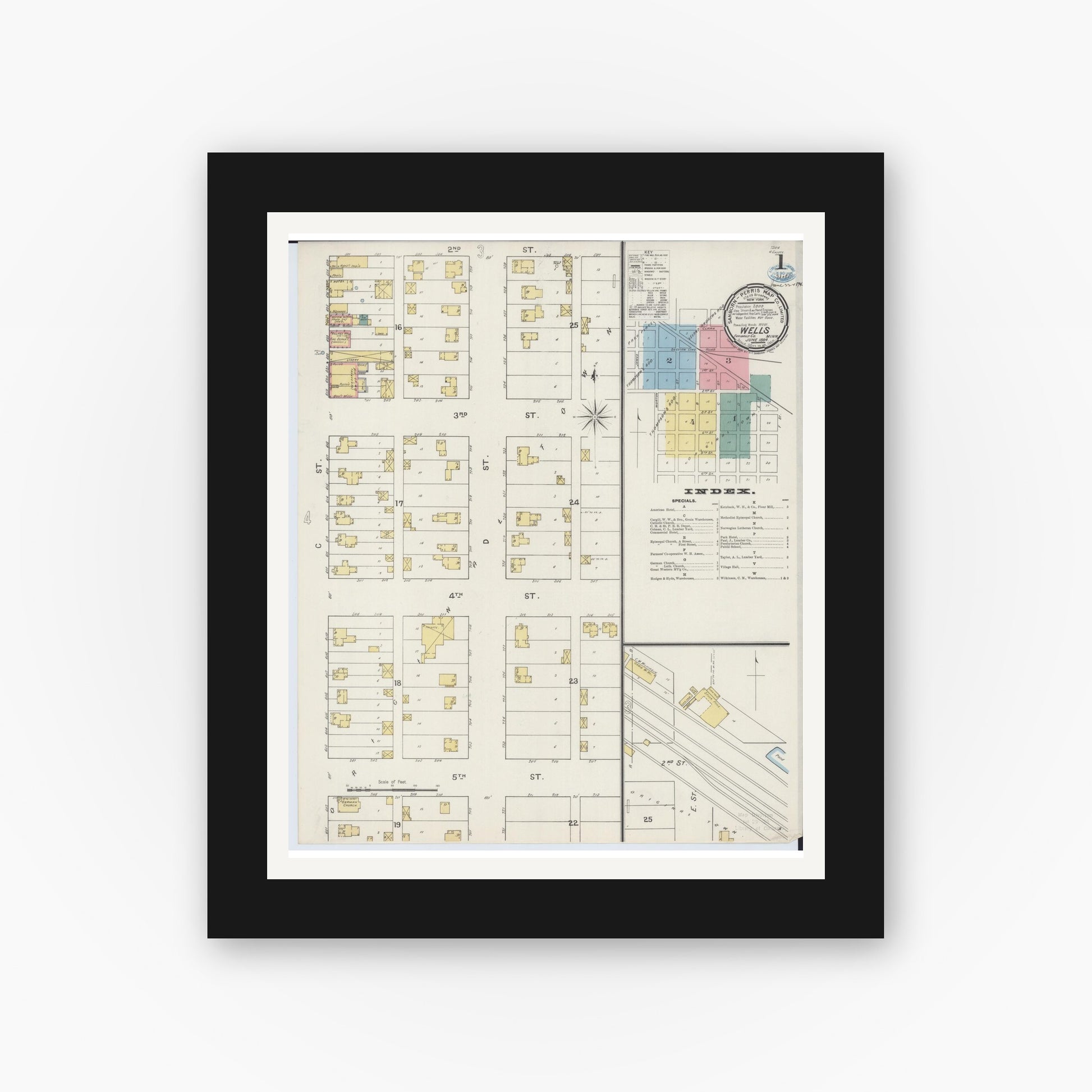 Old map wall art mockup — black gallery frame with white mat — Sanborn Fire Insurance Map from Wells, Faribault County, Minnesota (1894) - Complete Map Set