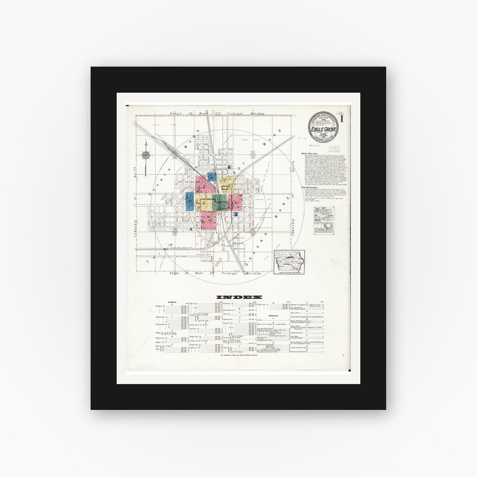 Old map wall art mockup — black gallery frame with white mat — Sanborn Fire Insurance Map from Eagle Grove, Wright County, Iowa (1921) â€” Complete Set