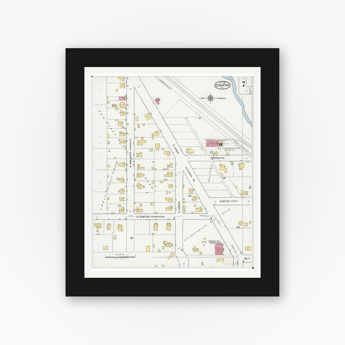 Old map wall art mockup — black gallery frame with white mat — Sanborn Fire Insurance Map from Staunton, Macoupin County, Illinois (1921), Sheet #0007