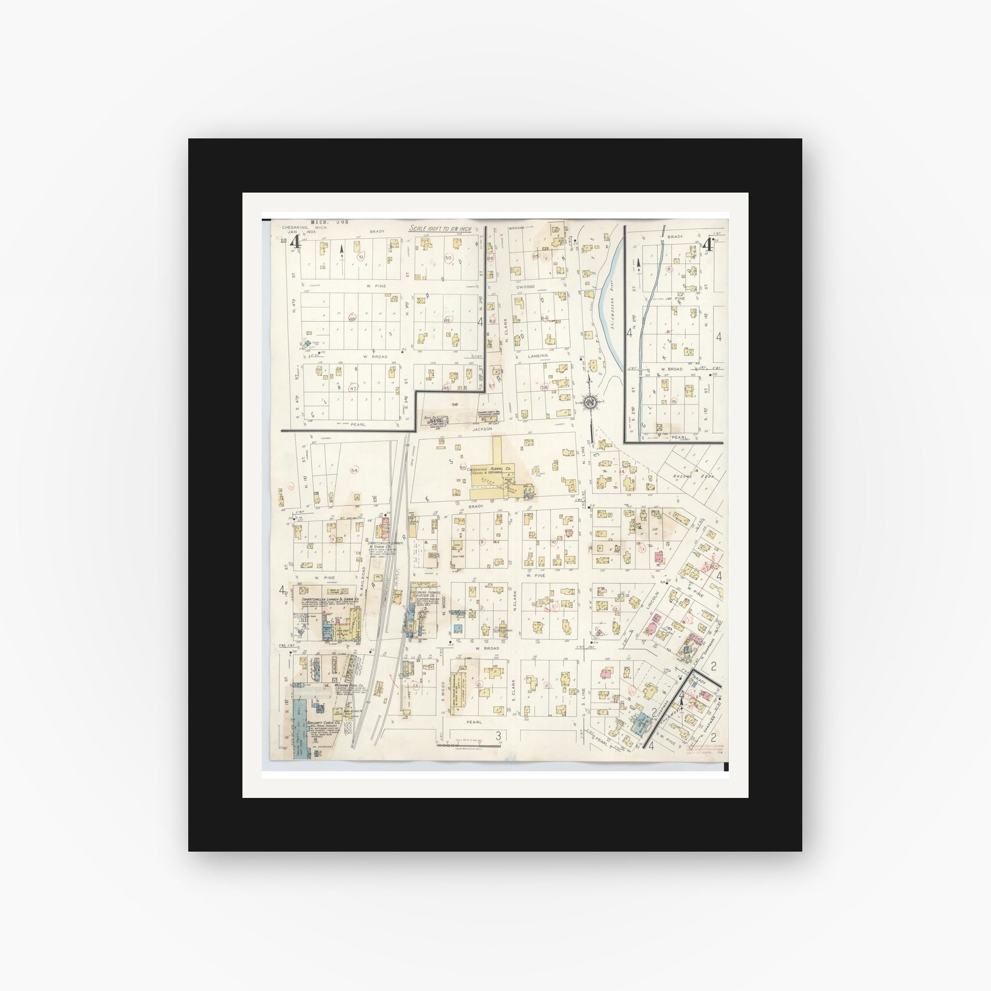 Old map wall art mockup — black gallery frame with white mat — Sanborn Fire Insurance Map from Chesaning, Saginaw County, Michigan (1944), Sheet #0004