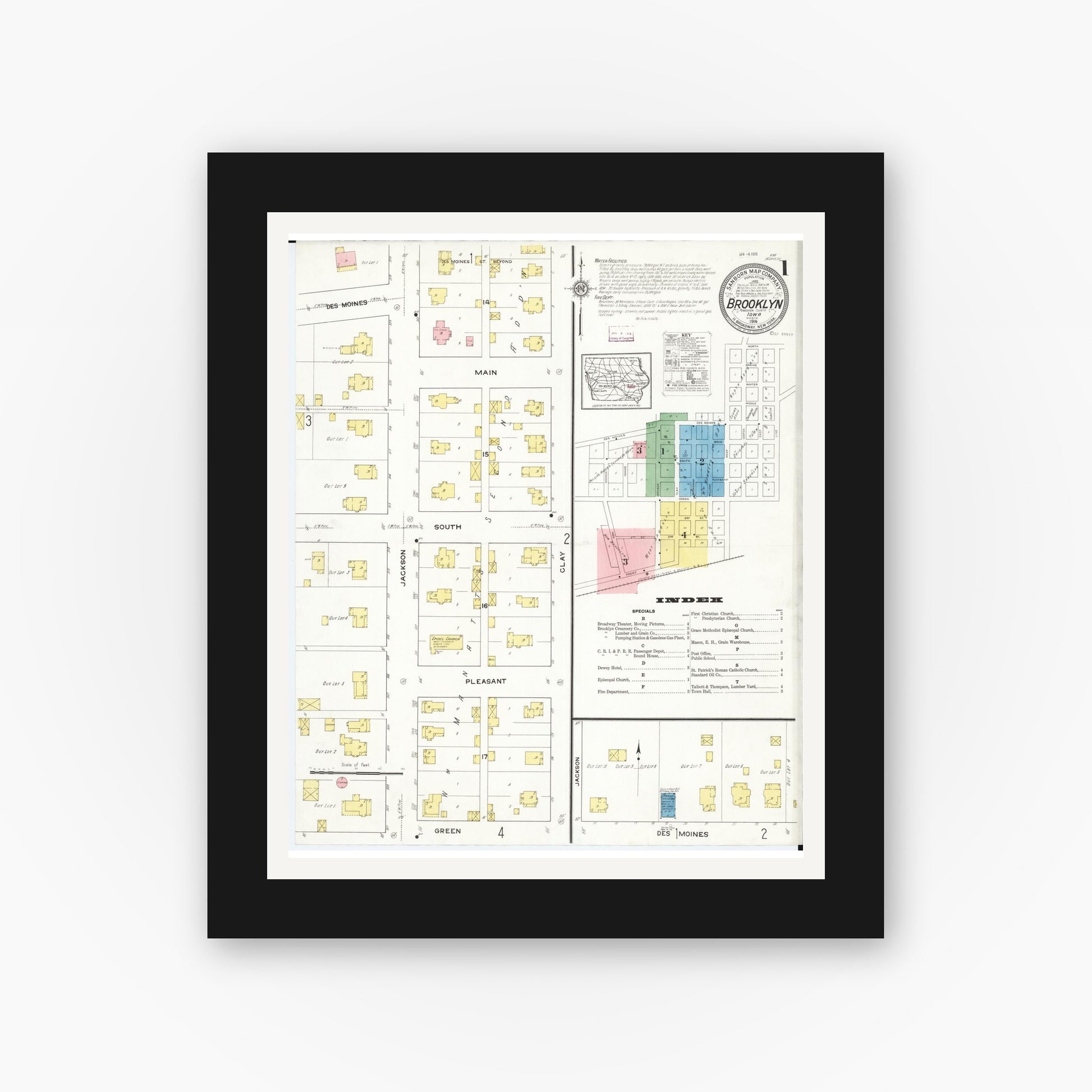 Old map wall art mockup — black gallery frame with white mat — Sanborn Fire Insurance Map from Brooklyn, Poweshiek County, Iowa (1916) â€” Complete Set