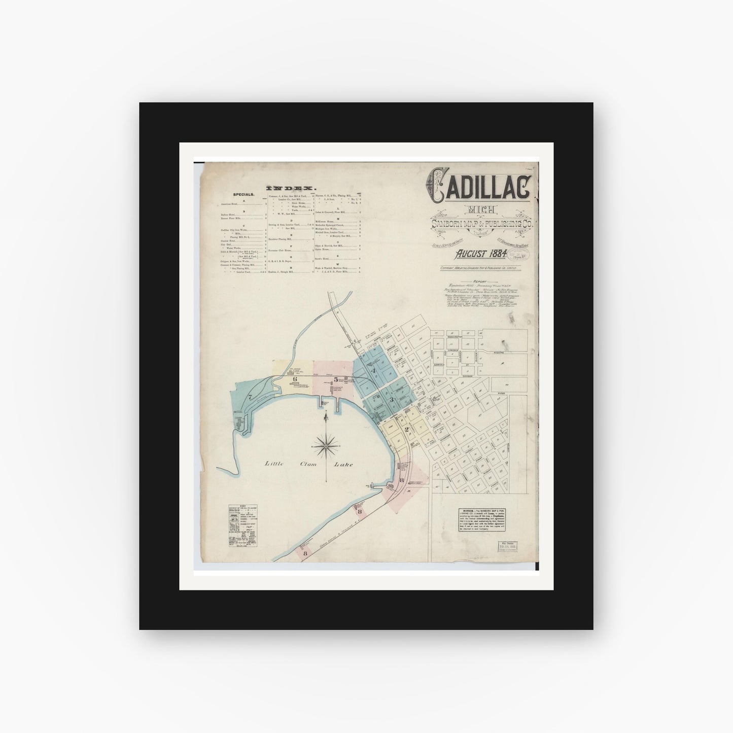 Old map wall art mockup — black gallery frame with white mat — Sanborn Fire Insurance Map from Cadillac, Wexford County, Michigan (1884) - Complete Map Set