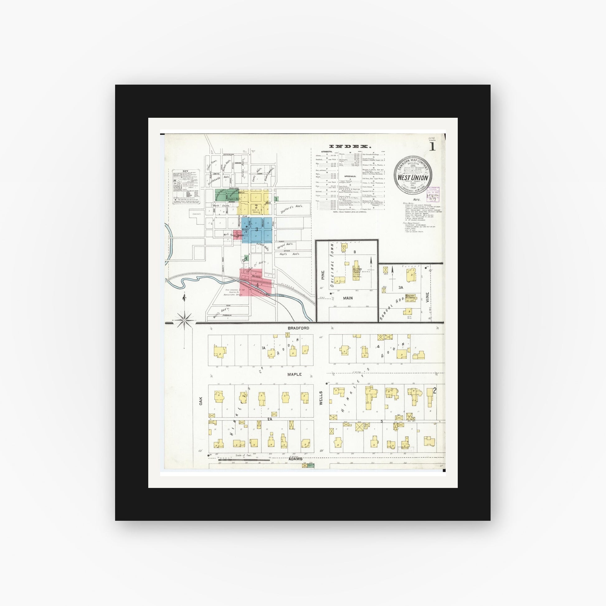 Old map wall art mockup — black gallery frame with white mat — Sanborn Fire Insurance Map from West Union, Fayette County, Iowa (1902) â€” Complete Set