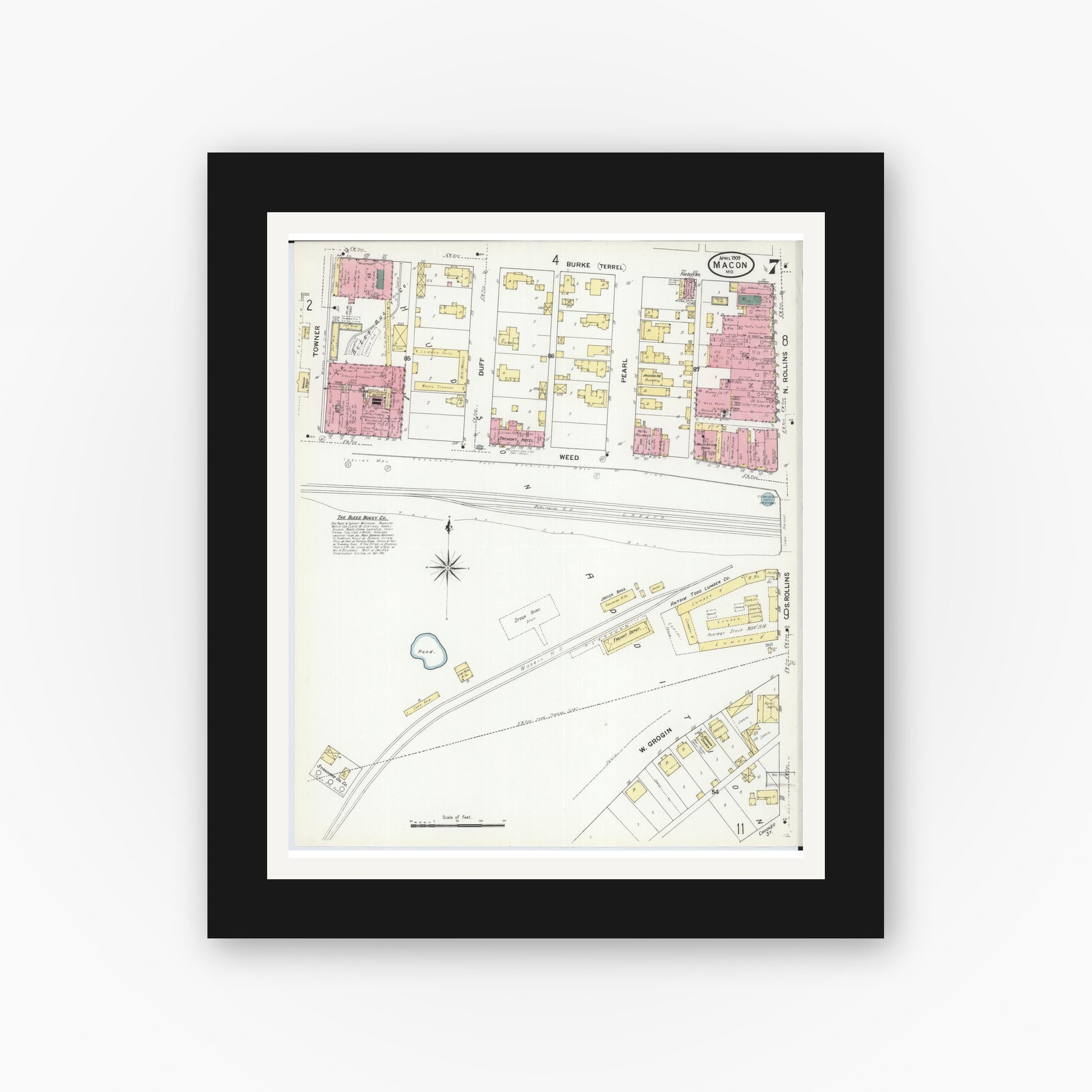 Old map wall art mockup — black gallery frame with white mat — Sanborn Fire Insurance Map from Macon, Macon County, Missouri (1909), Sheet #0007