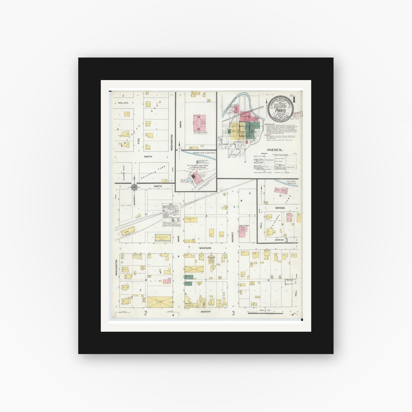 Old map wall art mockup — black gallery frame with white mat — Sanborn Fire Insurance Map from Paris, Monroe County, Missouri (1910), Sheet #0001