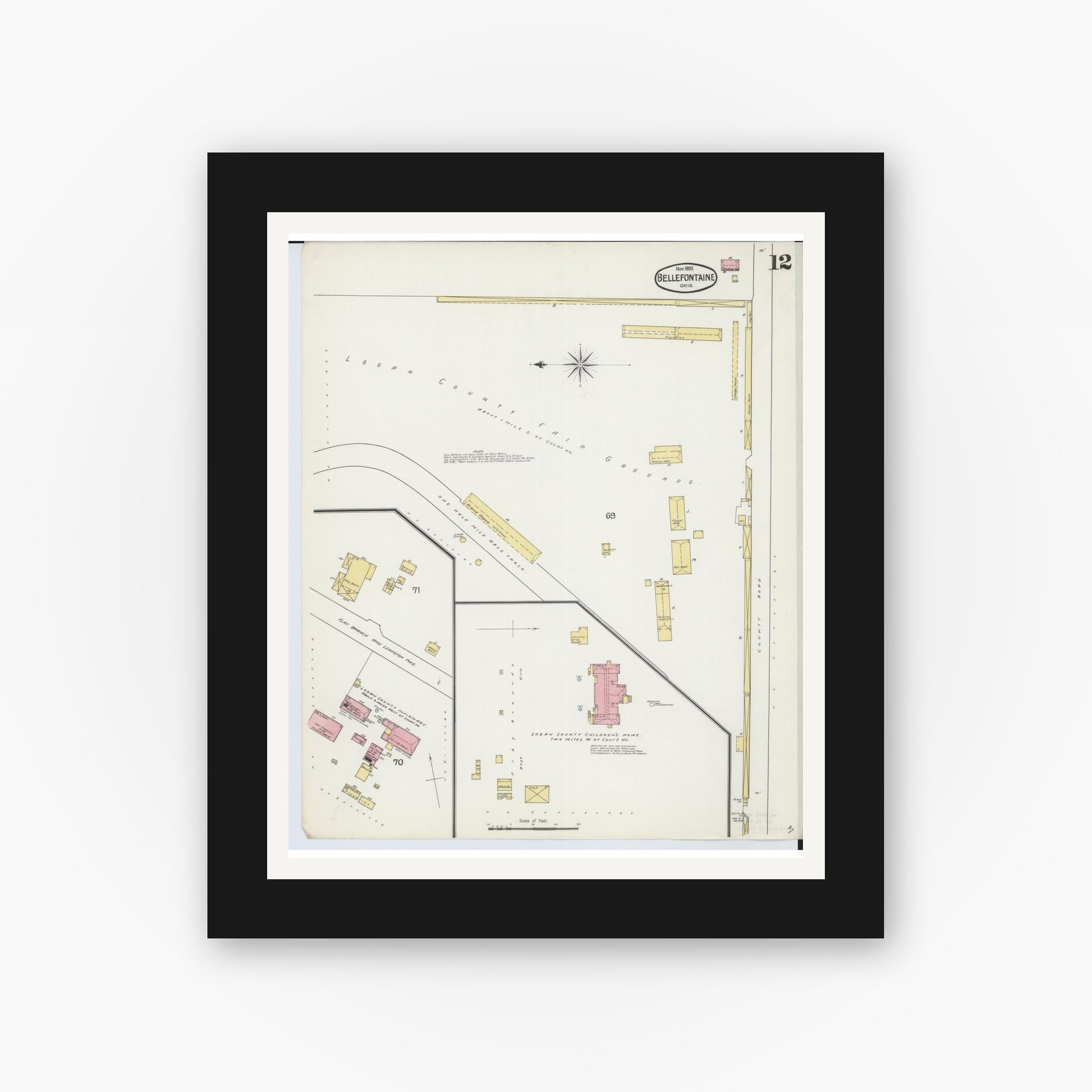 Old map wall art mockup — black gallery frame with white mat — Sanborn Fire Insurance Map from Bellefontaine, Logan County, Ohio (1892), Sheet #0012