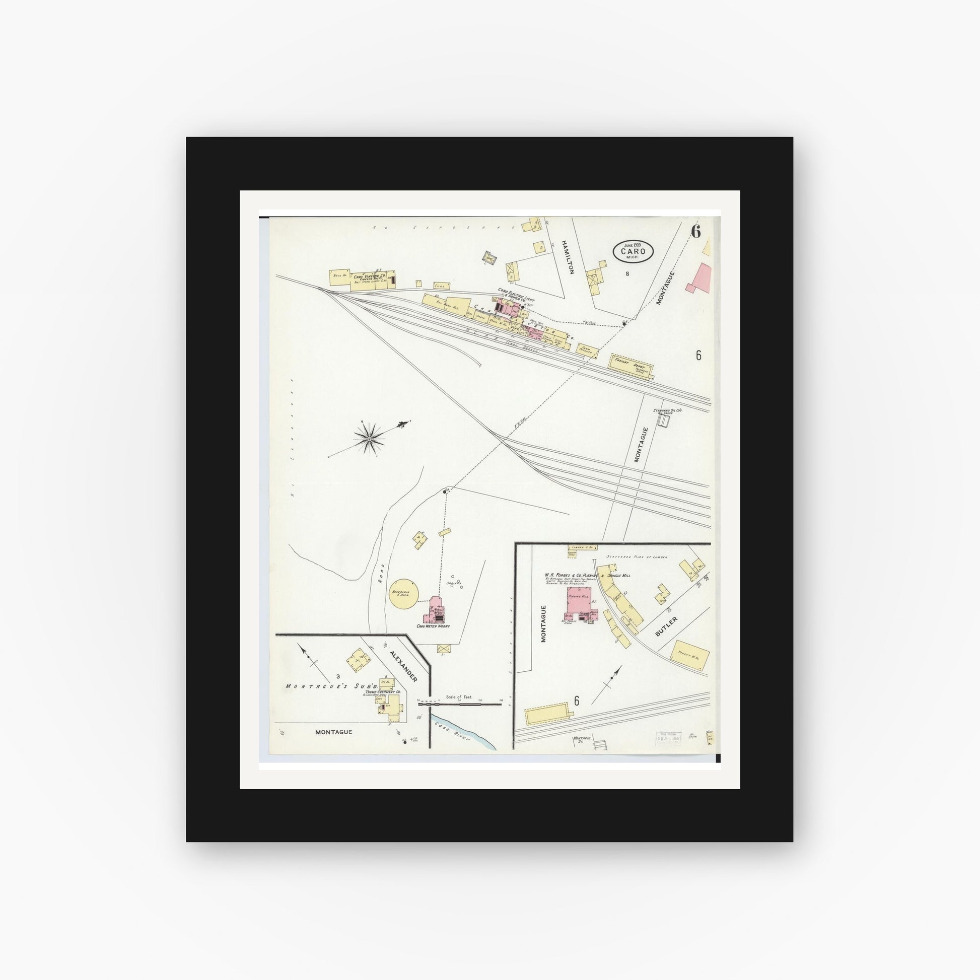 Old map wall art mockup — black gallery frame with white mat — Sanborn Fire Insurance Map from Caro, Tuscola County, Michigan (1909), Sheet #0006