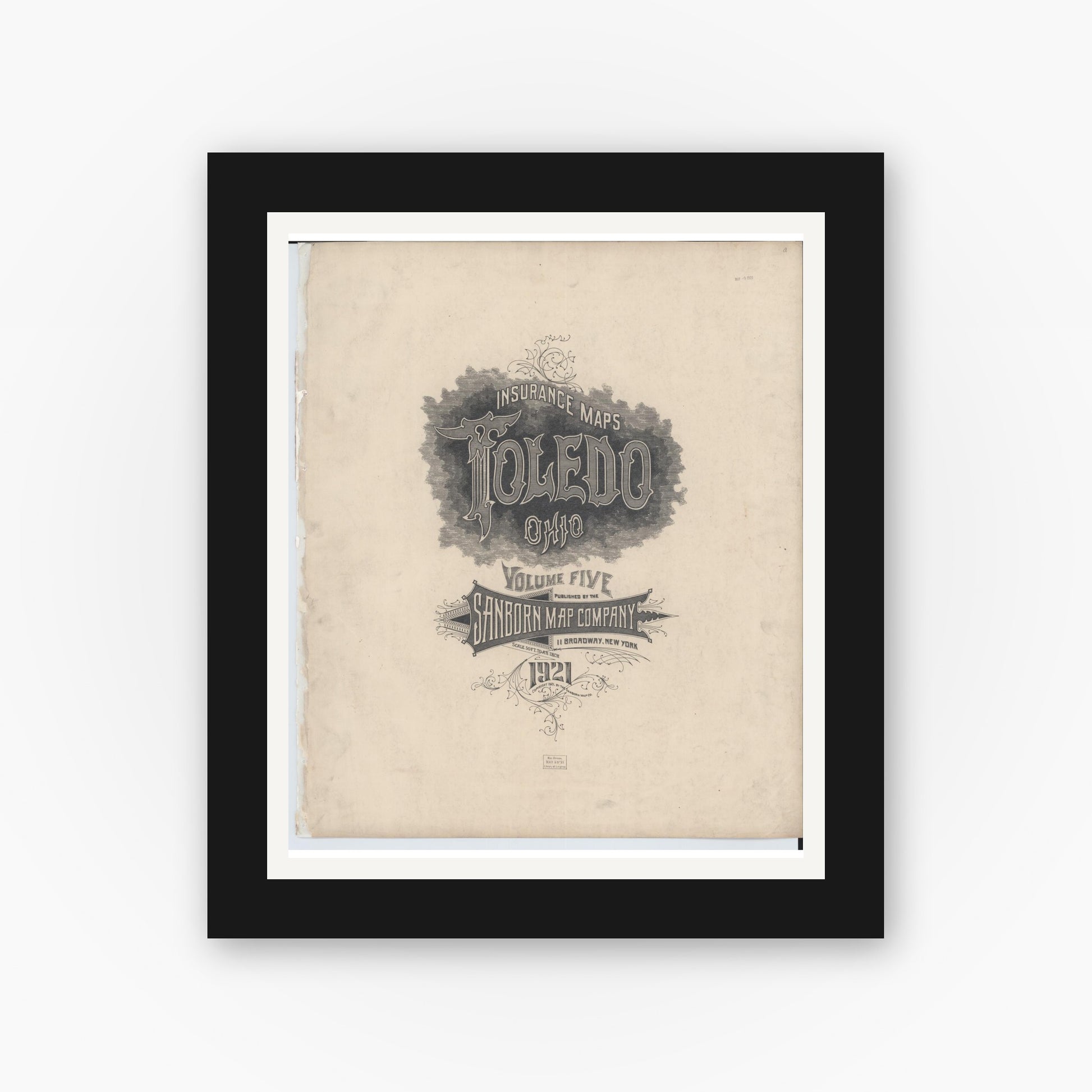 Old map wall art mockup — black gallery frame with white mat — Sanborn Fire Insurance Map from Toledo, Lucas County, Ohio (1921), Sheet #0001