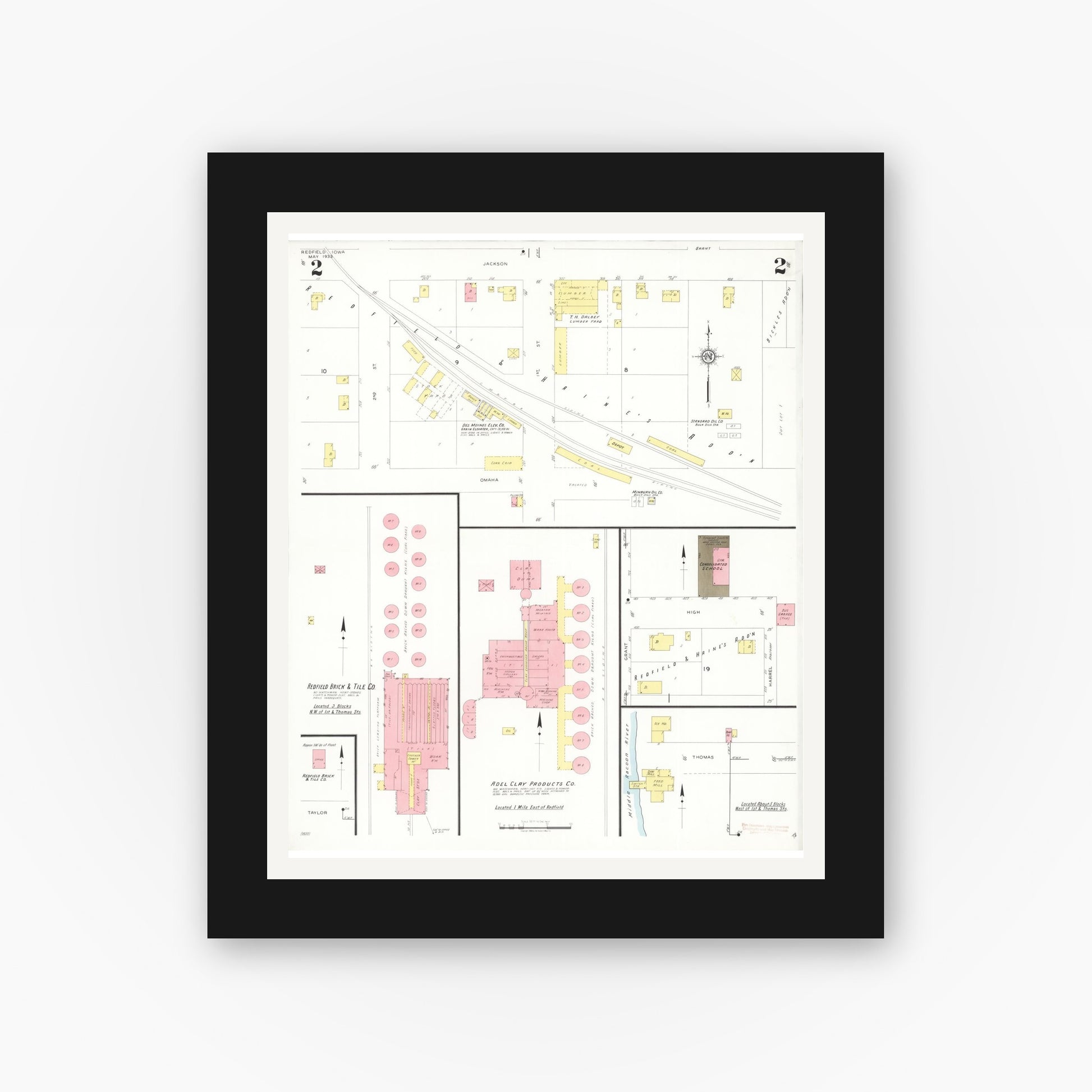 Old map wall art mockup — black gallery frame with white mat — Sanborn Fire Insurance Map from Redfield, Dallas County, Iowa (1933), Sheet #0002