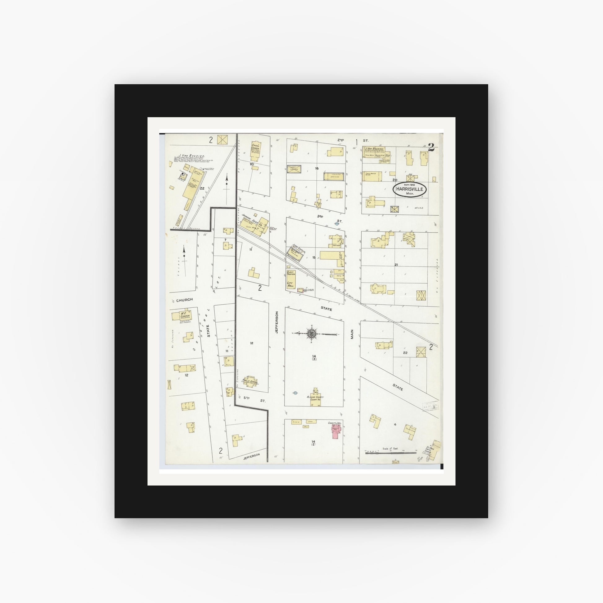 Old map wall art mockup — black gallery frame with white mat — Sanborn Fire Insurance Map from Harrisville, Alcona County, Michigan (1910), Sheet #0002