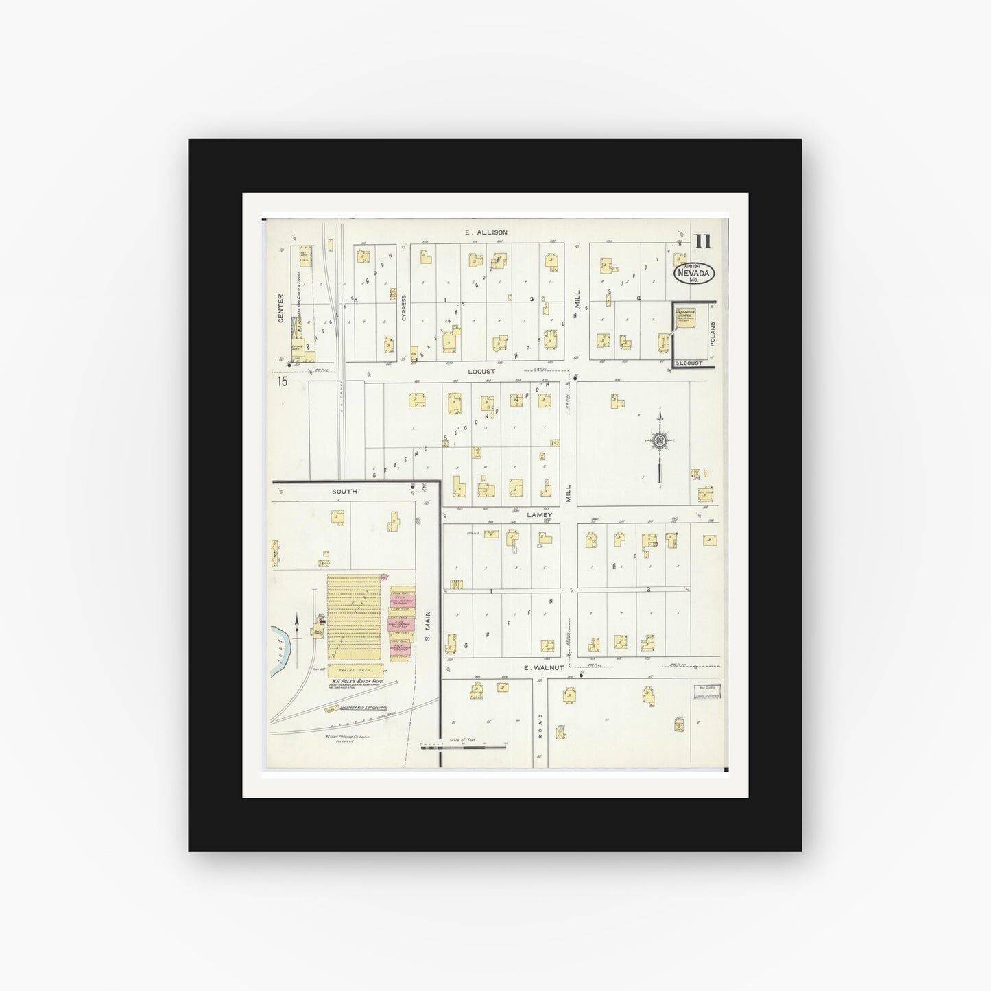 Old map wall art mockup — black gallery frame with white mat — Sanborn Fire Insurance Map from Nevada, Vernon County, Missouri (1914), Sheet #0011