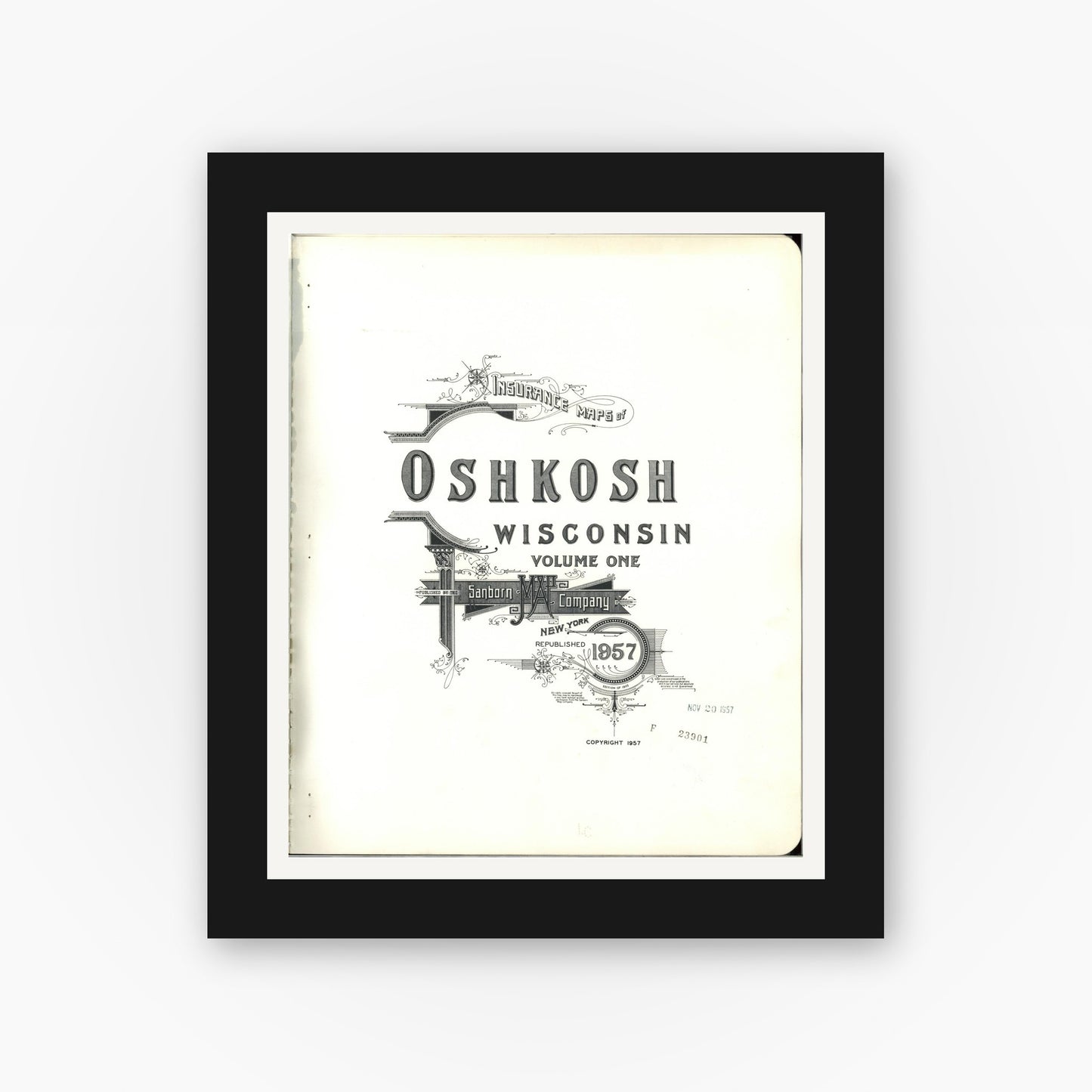 Old map wall art mockup — black gallery frame with white mat — Sanborn Fire Insurance Map from Oshkosh, Winnebago County, Wisconsin (1957), Sheet #0001