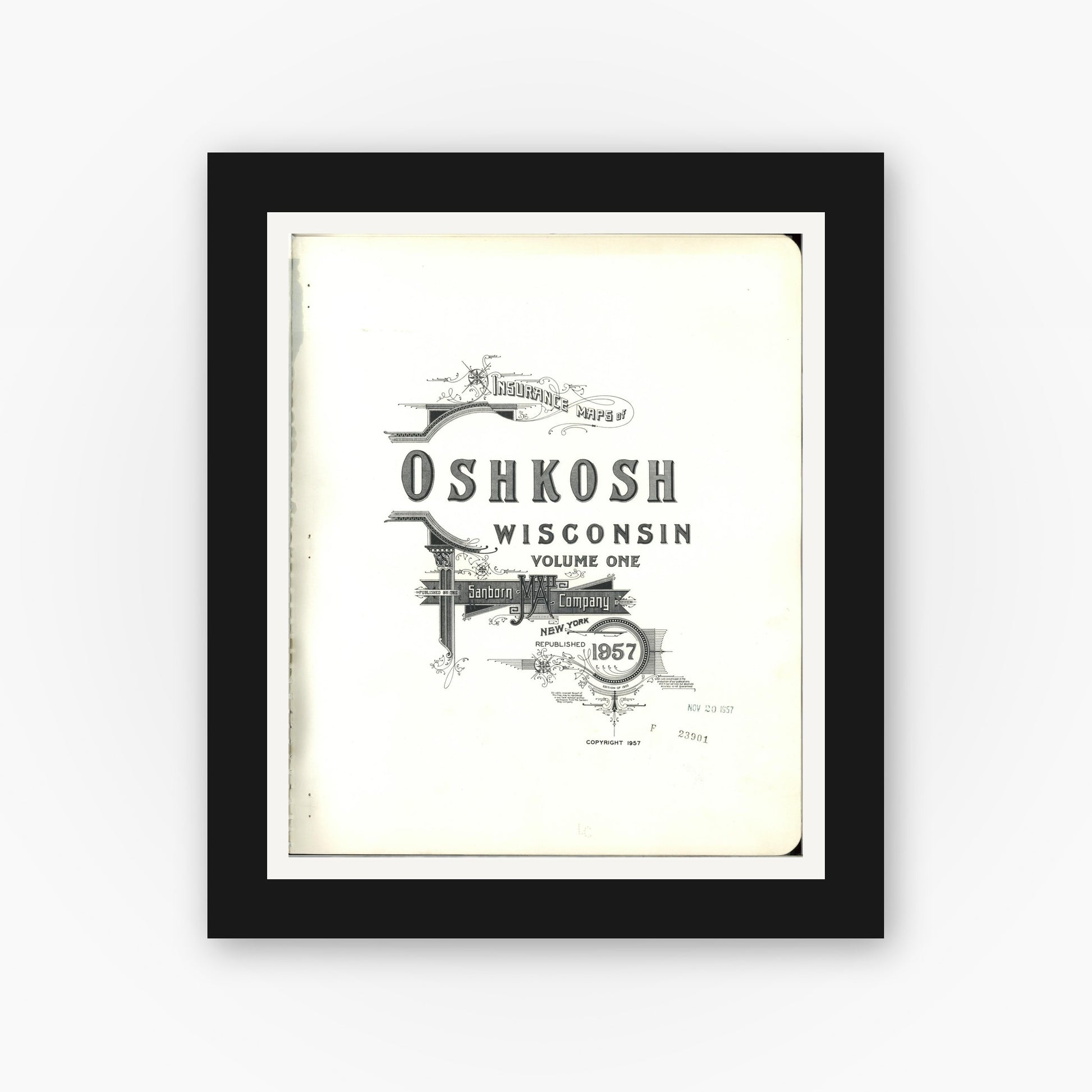 Old map wall art mockup — black gallery frame with white mat — Sanborn Fire Insurance Map from Oshkosh, Winnebago County, Wisconsin (1957), Sheet #0001