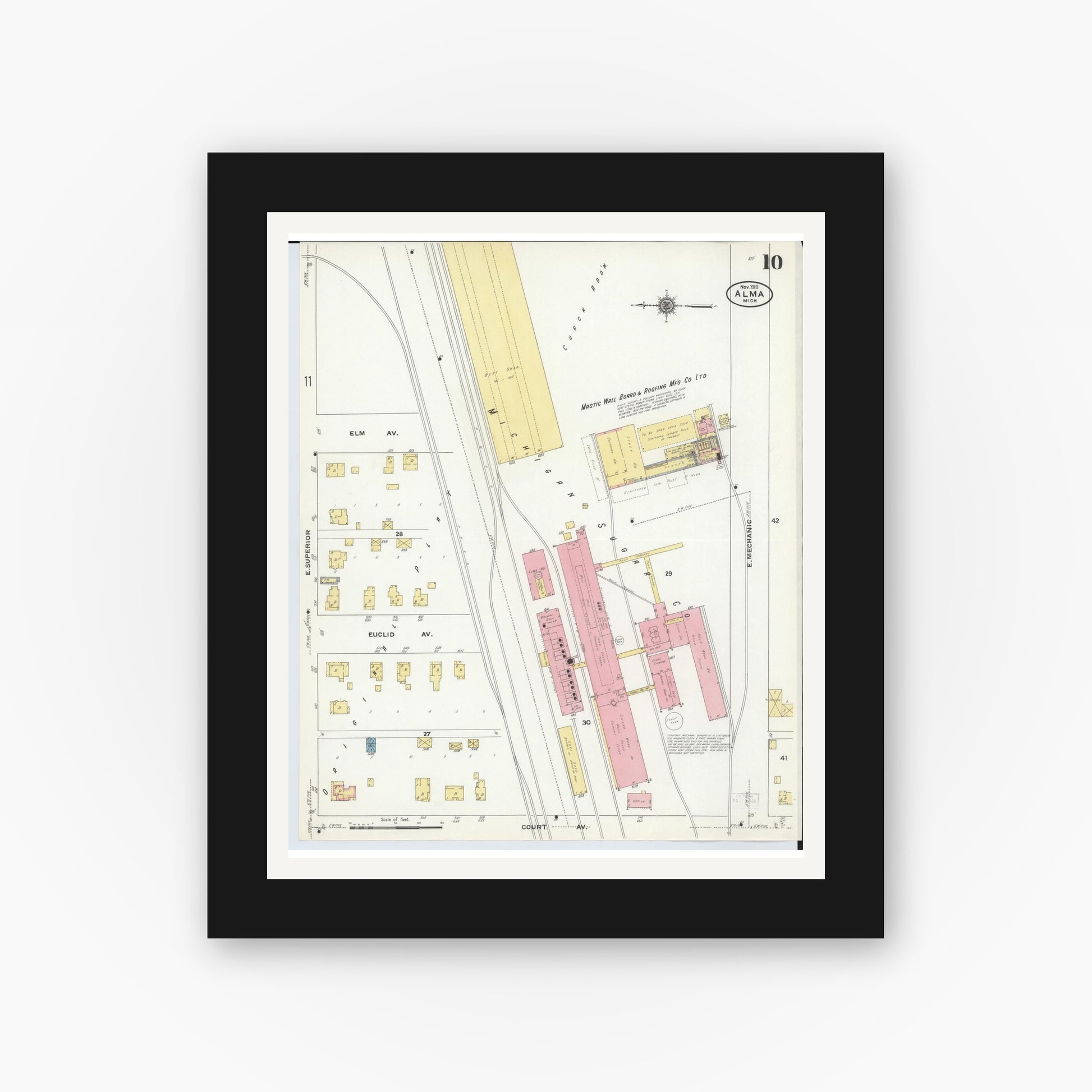 Old map wall art mockup — black gallery frame with white mat — Sanborn Fire Insurance Map from Alma, Gratiot County, Michigan (1910), Sheet #0010