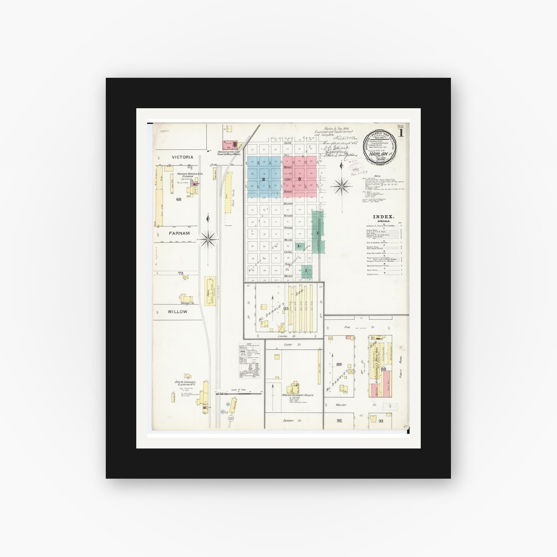 Old map wall art mockup — black gallery frame with white mat — Sanborn Fire Insurance Map from Harlan, Shelby County, Iowa (1893) â€” Complete Set