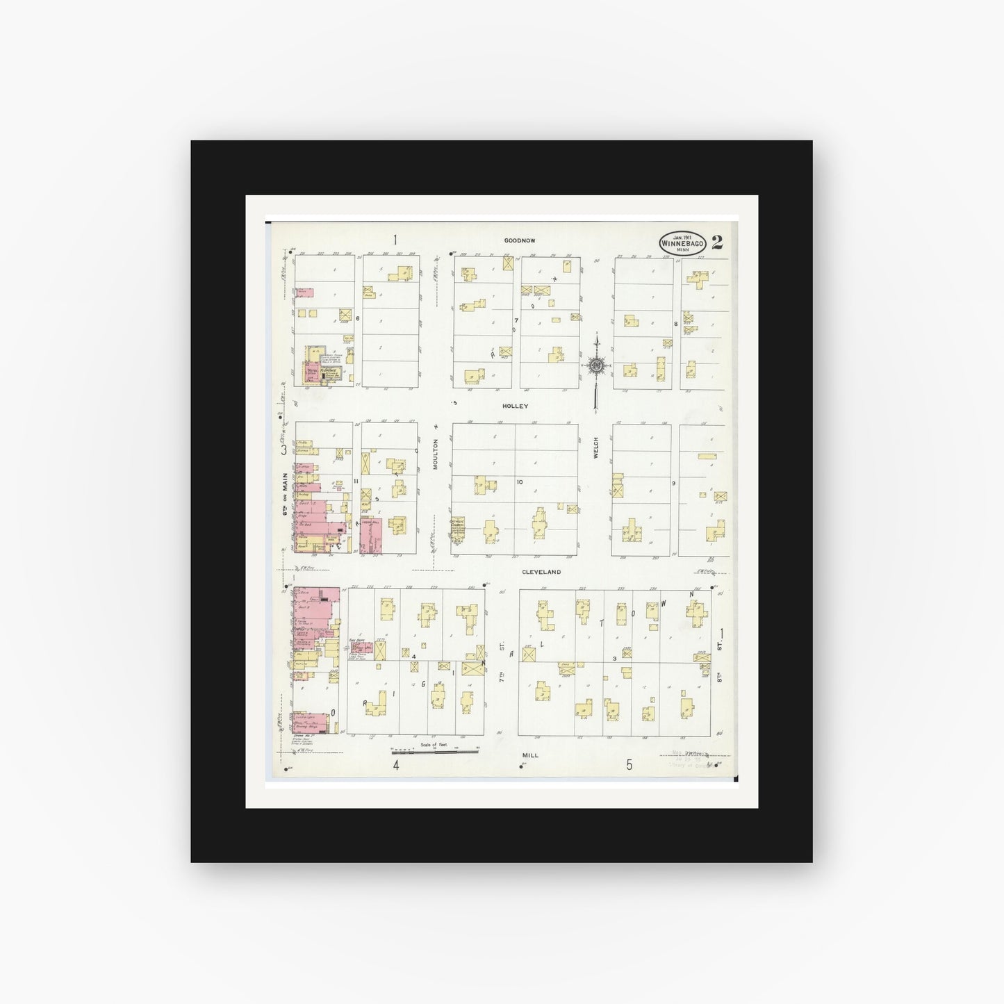 Old map wall art mockup — black gallery frame with white mat — Sanborn Fire Insurance Map from Winnebago, Faribault County, Minnesota (1911), Sheet #0002