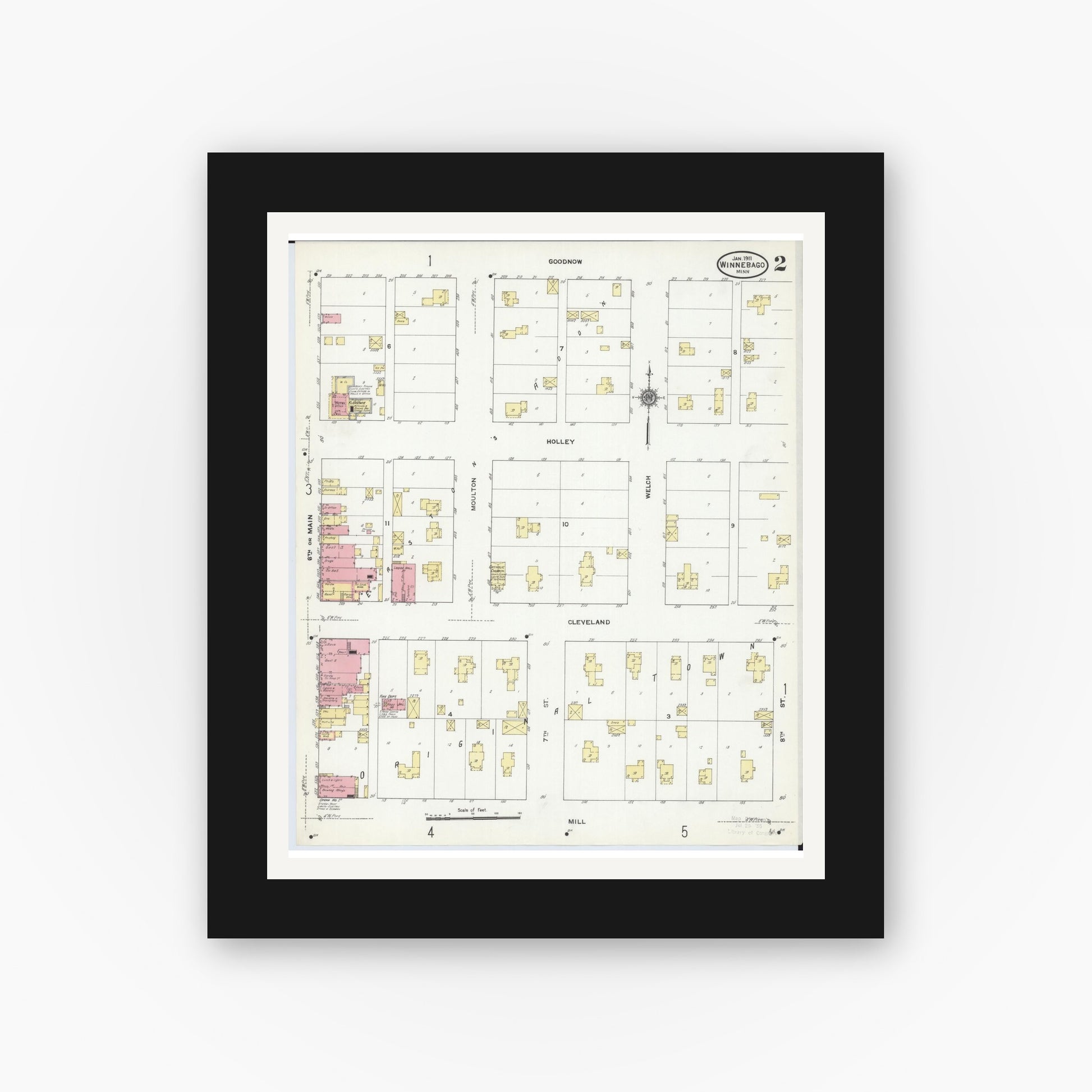 Old map wall art mockup — black gallery frame with white mat — Sanborn Fire Insurance Map from Winnebago, Faribault County, Minnesota (1911), Sheet #0002