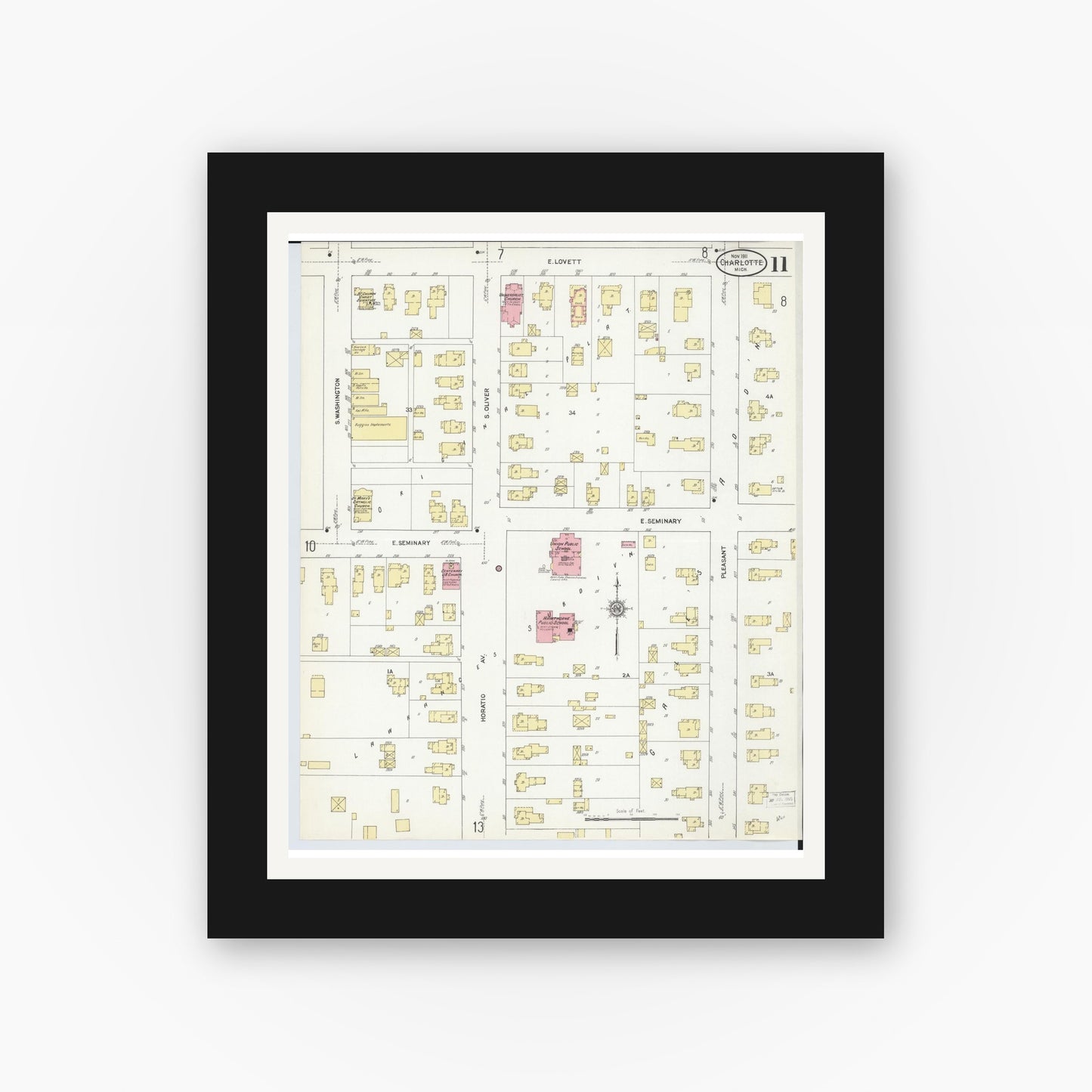 Old map wall art mockup — black gallery frame with white mat — Sanborn Fire Insurance Map from Charlotte, Eaton County, Michigan (1911), Sheet #0011