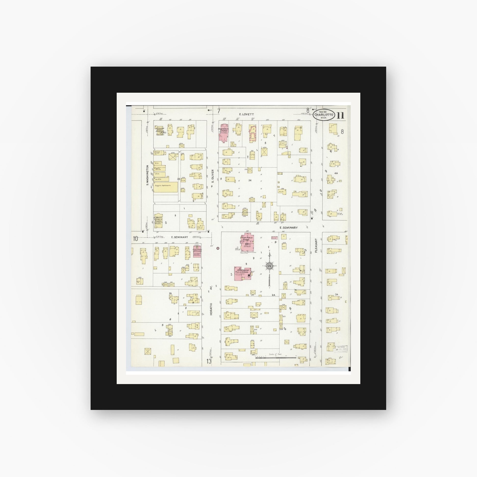 Old map wall art mockup — black gallery frame with white mat — Sanborn Fire Insurance Map from Charlotte, Eaton County, Michigan (1911), Sheet #0011