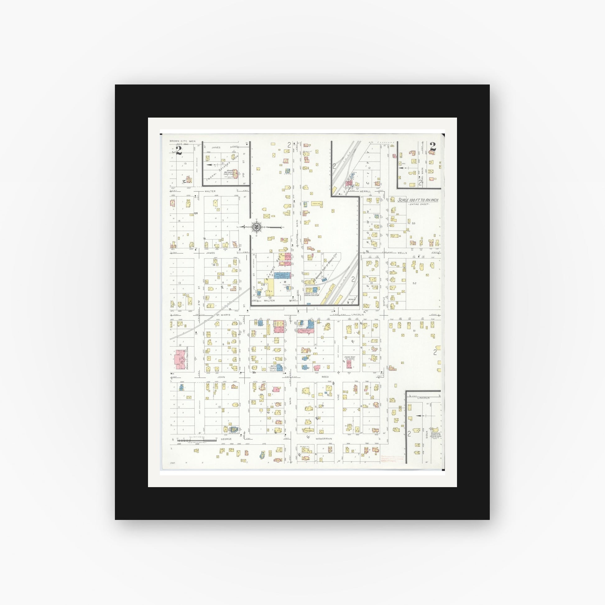 Old map wall art mockup — black gallery frame with white mat — Sanborn Fire Insurance Map from Brown City, Sanilac County, Michigan (1941), Sheet #0002