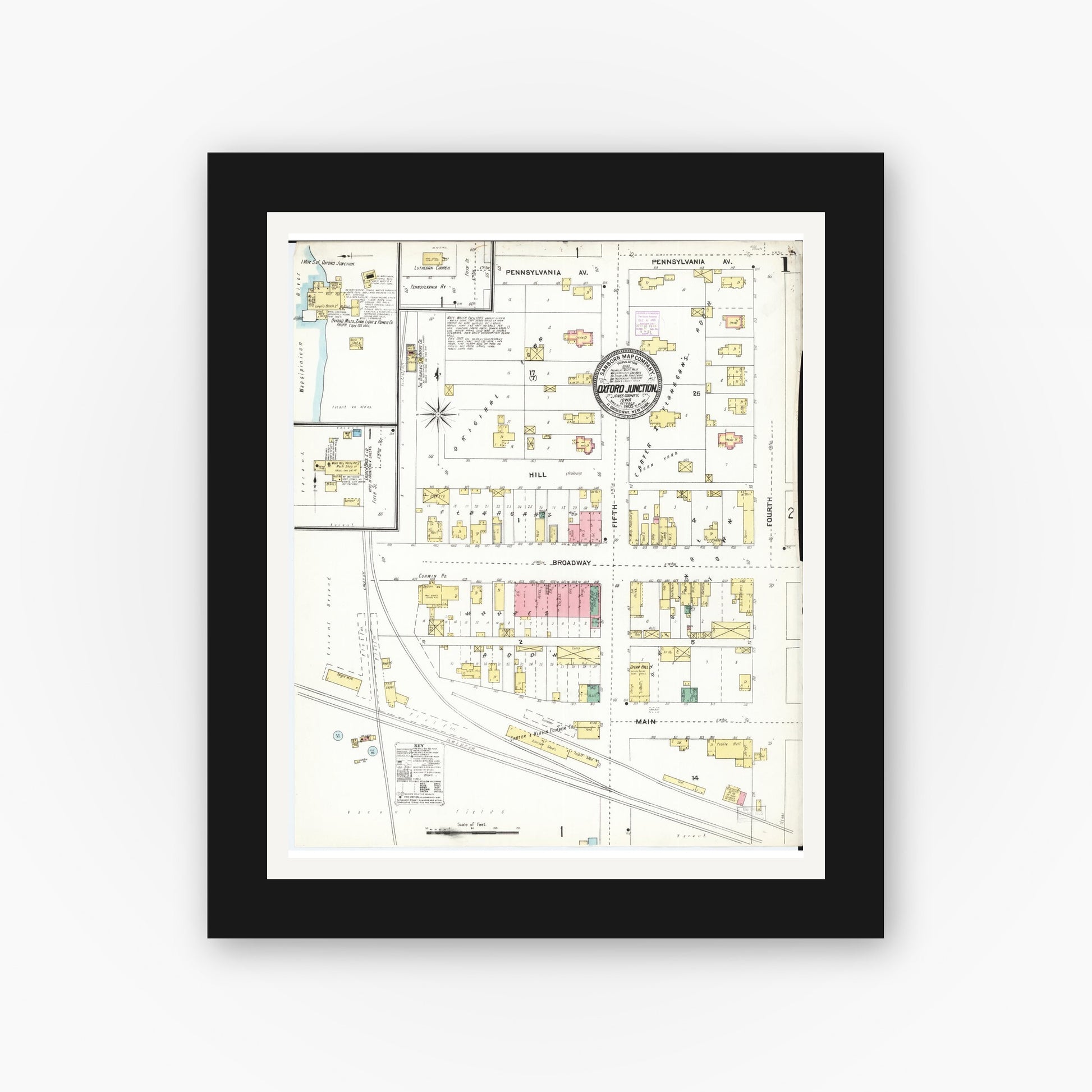 Old map wall art mockup — black gallery frame with white mat — Sanborn Fire Insurance Map from Oxford Junction, Jones County, Iowa (1905), Sheet #0001