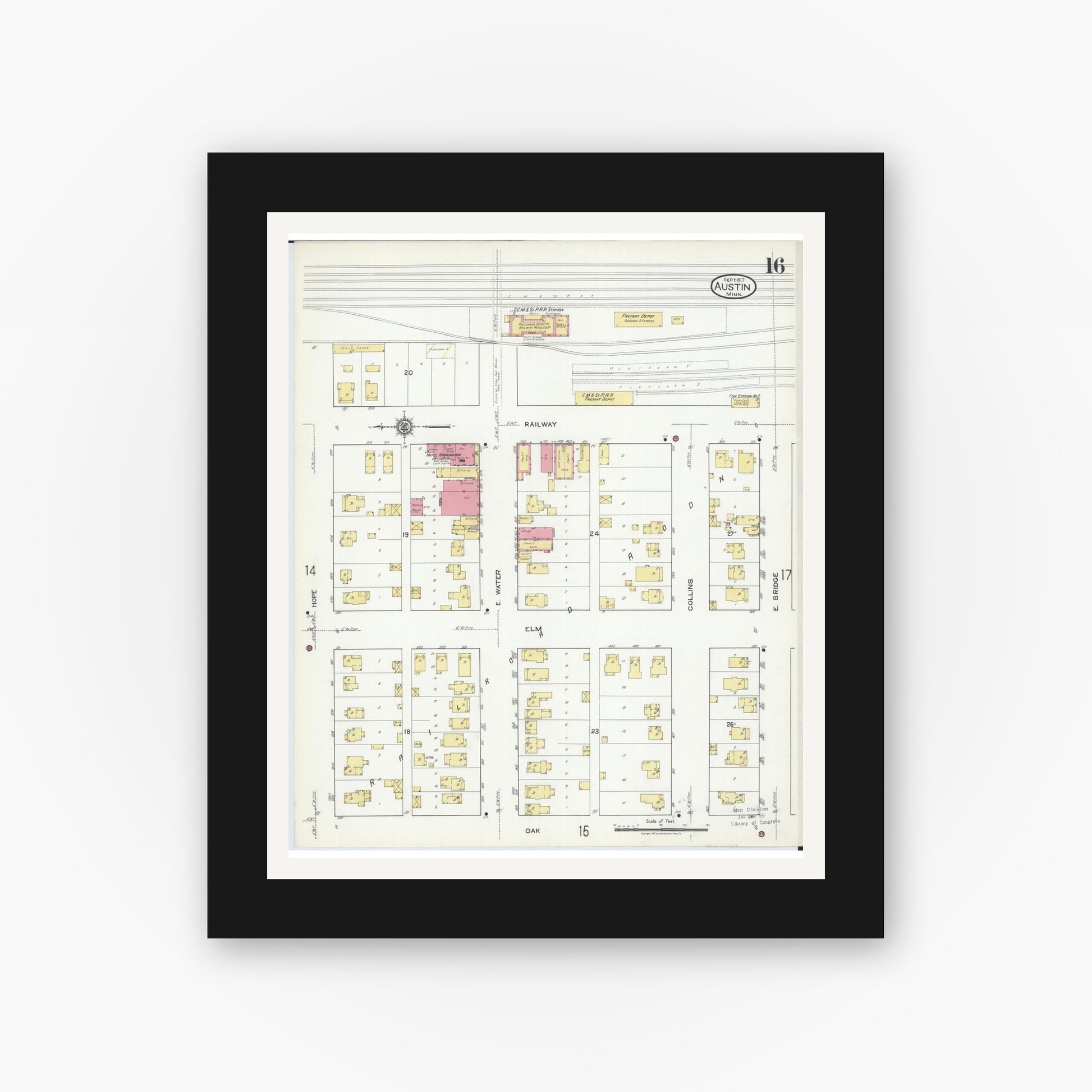 Old map wall art mockup — black gallery frame with white mat — Sanborn Fire Insurance Map from Austin, Mower County, Minnesota (1917), Sheet #0016