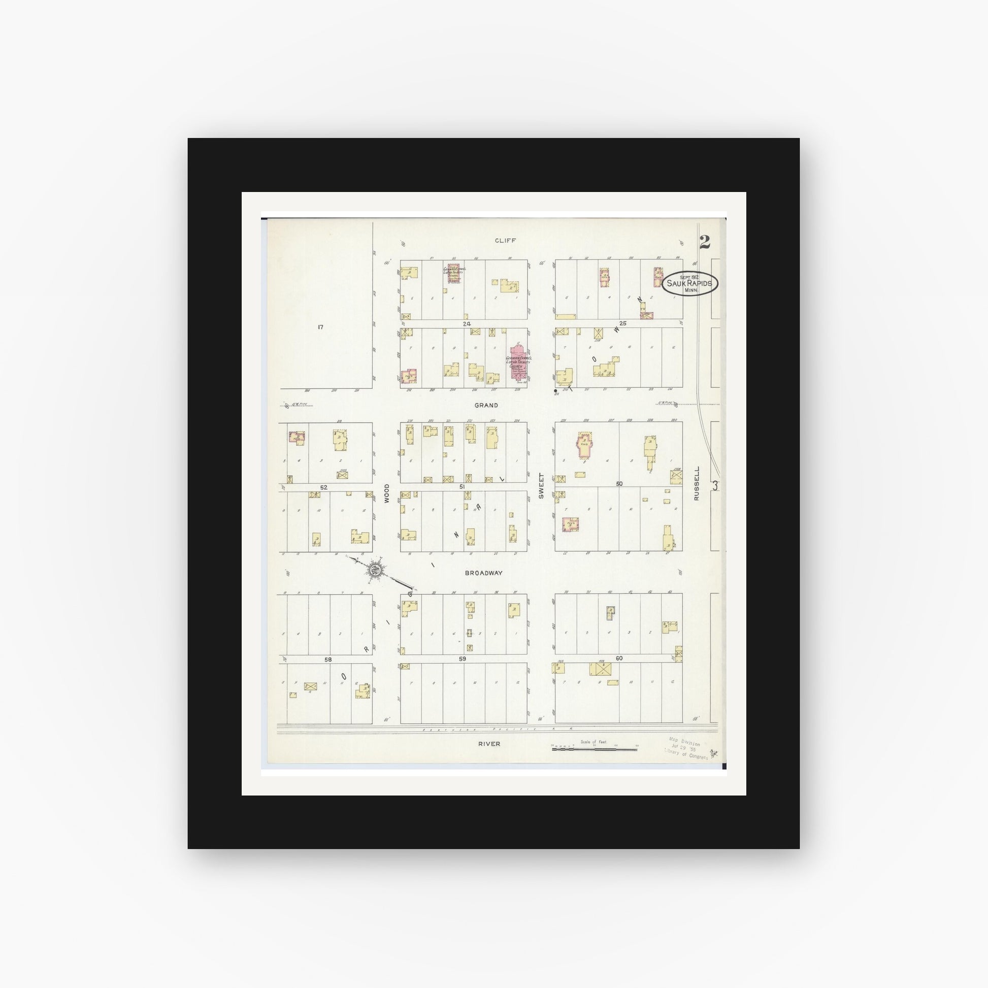 Old map wall art mockup — black gallery frame with white mat — Sanborn Fire Insurance Map from Sauk Rapids, Benton County, Minnesota (1912), Sheet #0002