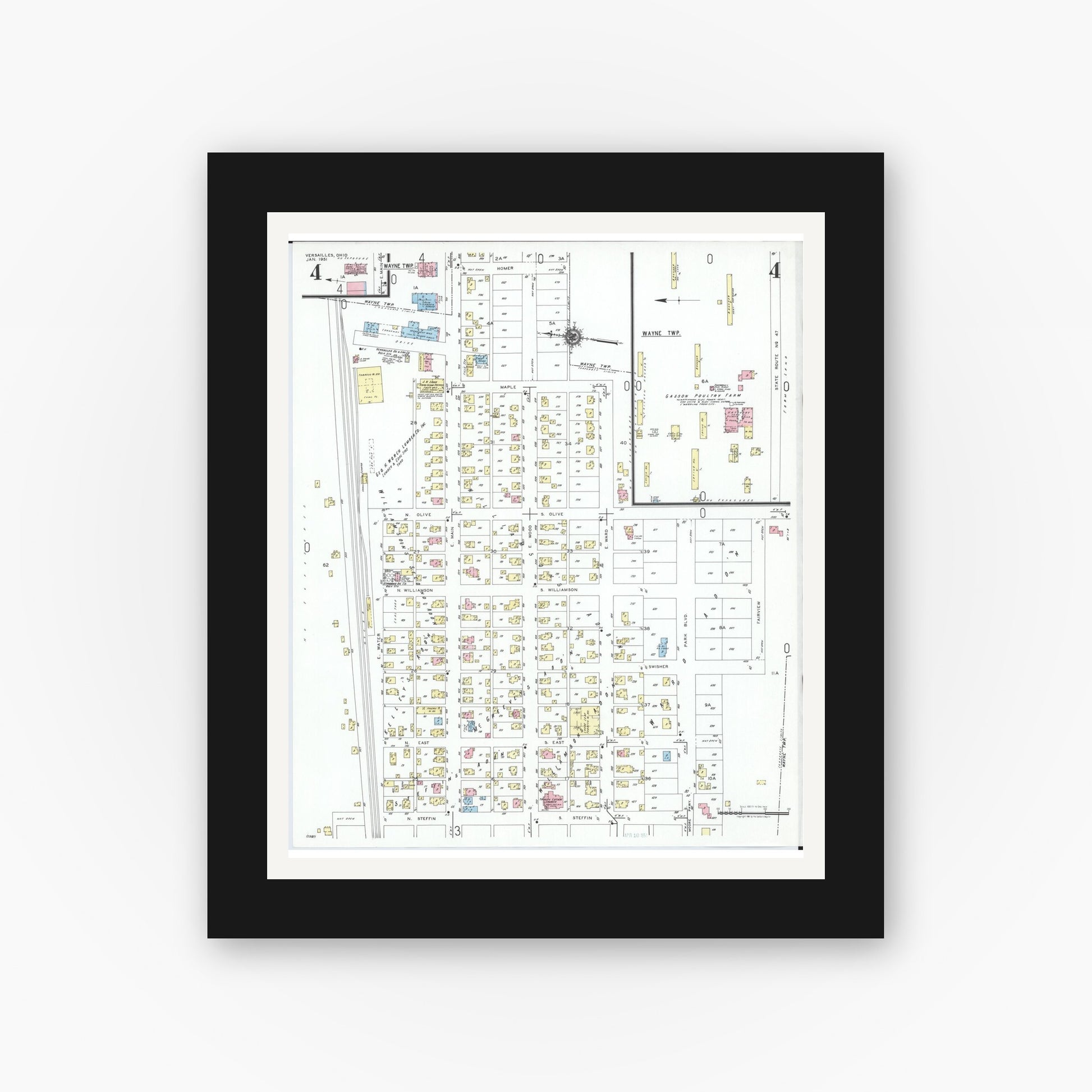 Old map wall art mockup — black gallery frame with white mat — Sanborn Fire Insurance Map from Versailles, Darke County, Ohio (1951), Sheet #0004