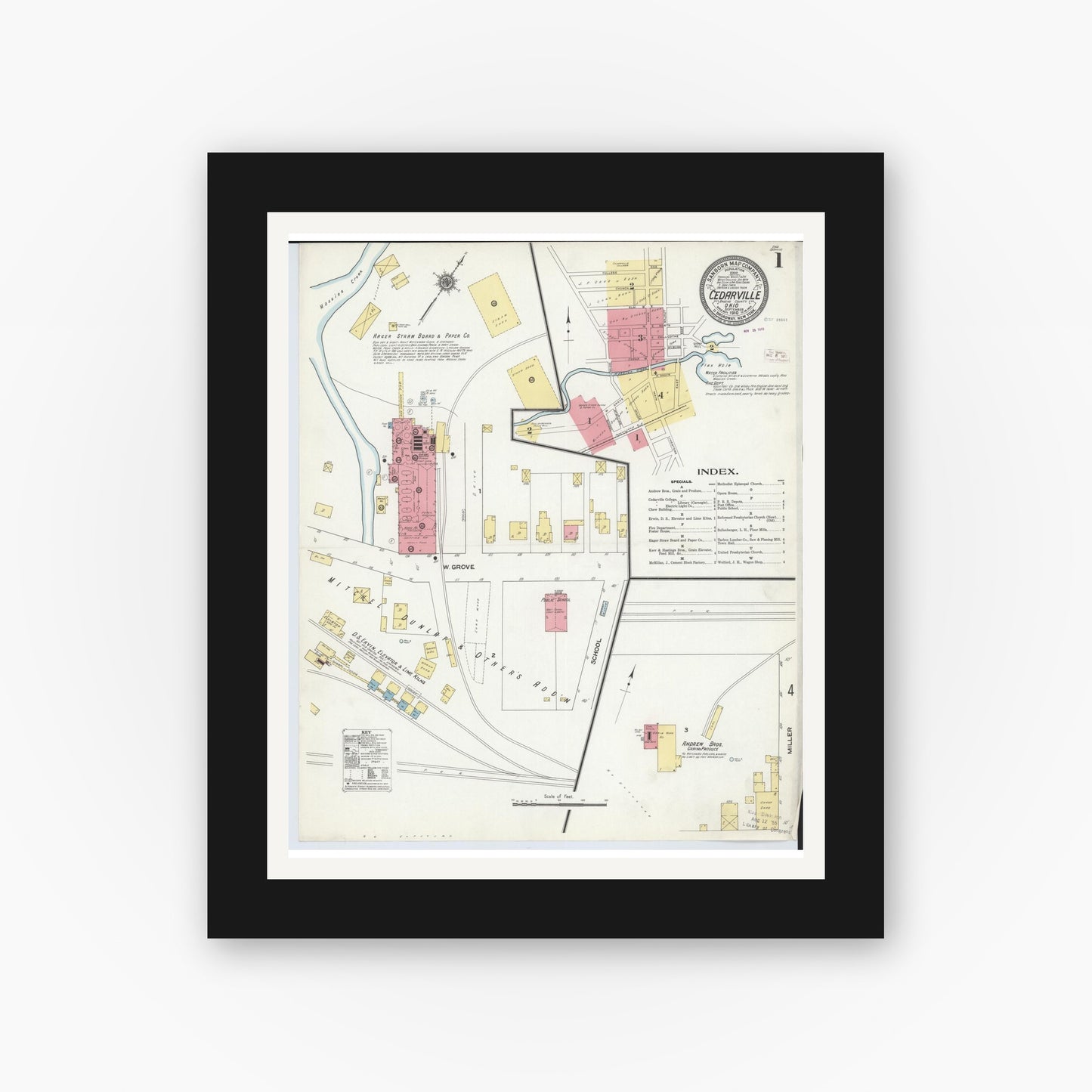 Old map wall art mockup — black gallery frame with white mat — Sanborn Fire Insurance Map from Cedarville, Greene County, Ohio (1910), Sheet #0001