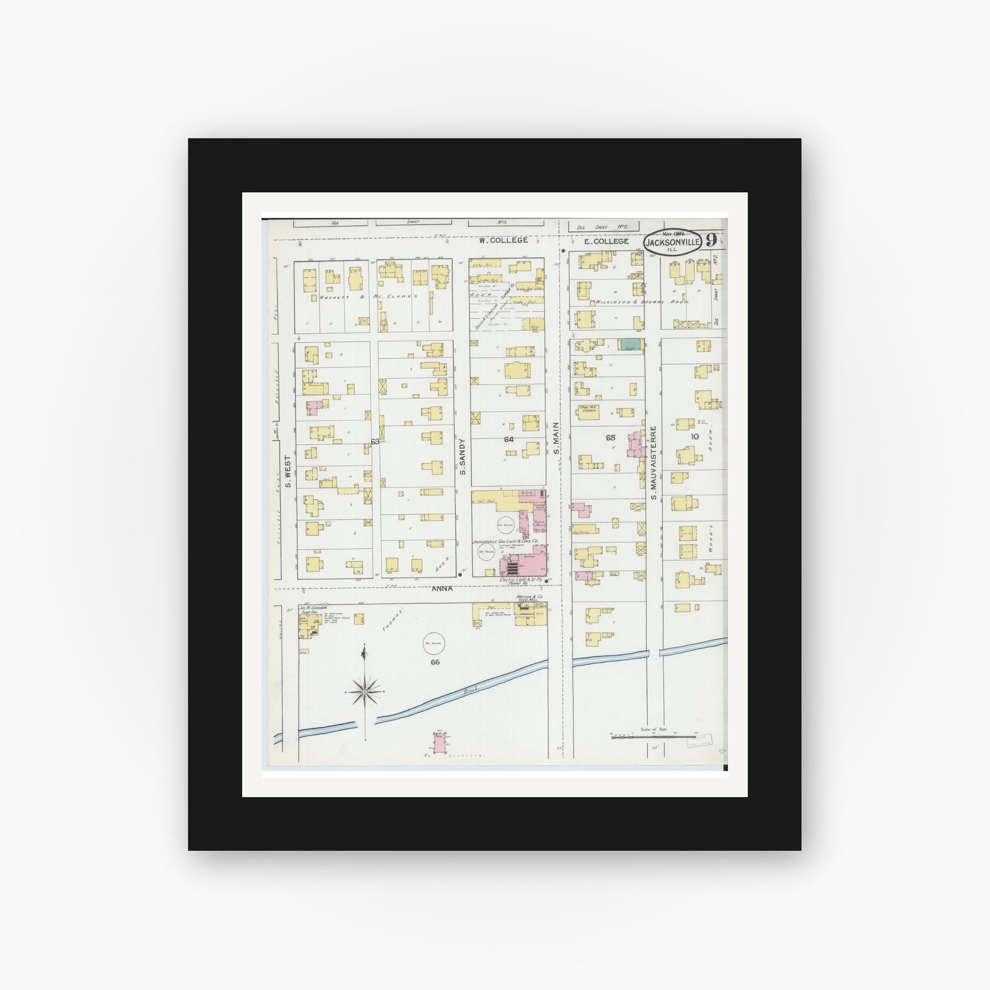 Old map wall art mockup — black gallery frame with white mat — Sanborn Fire Insurance Map from Jacksonville, Morgan County, Illinois (1892), Sheet #0009