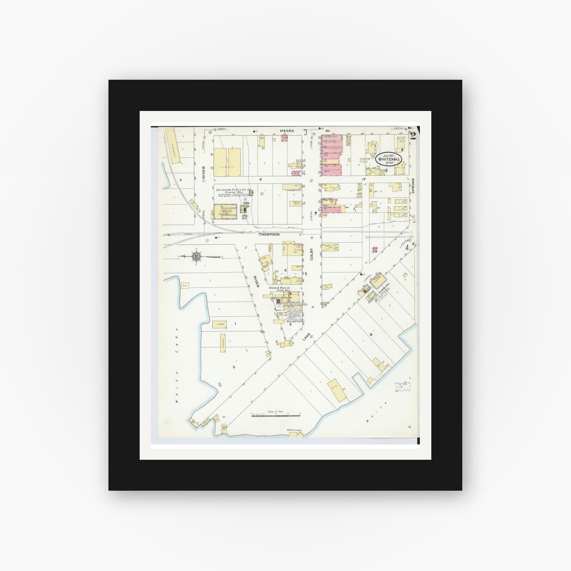 Old map wall art mockup — black gallery frame with white mat — Sanborn Fire Insurance Map from Whitehall, Muskegon County, Michigan (1910), Sheet #0002
