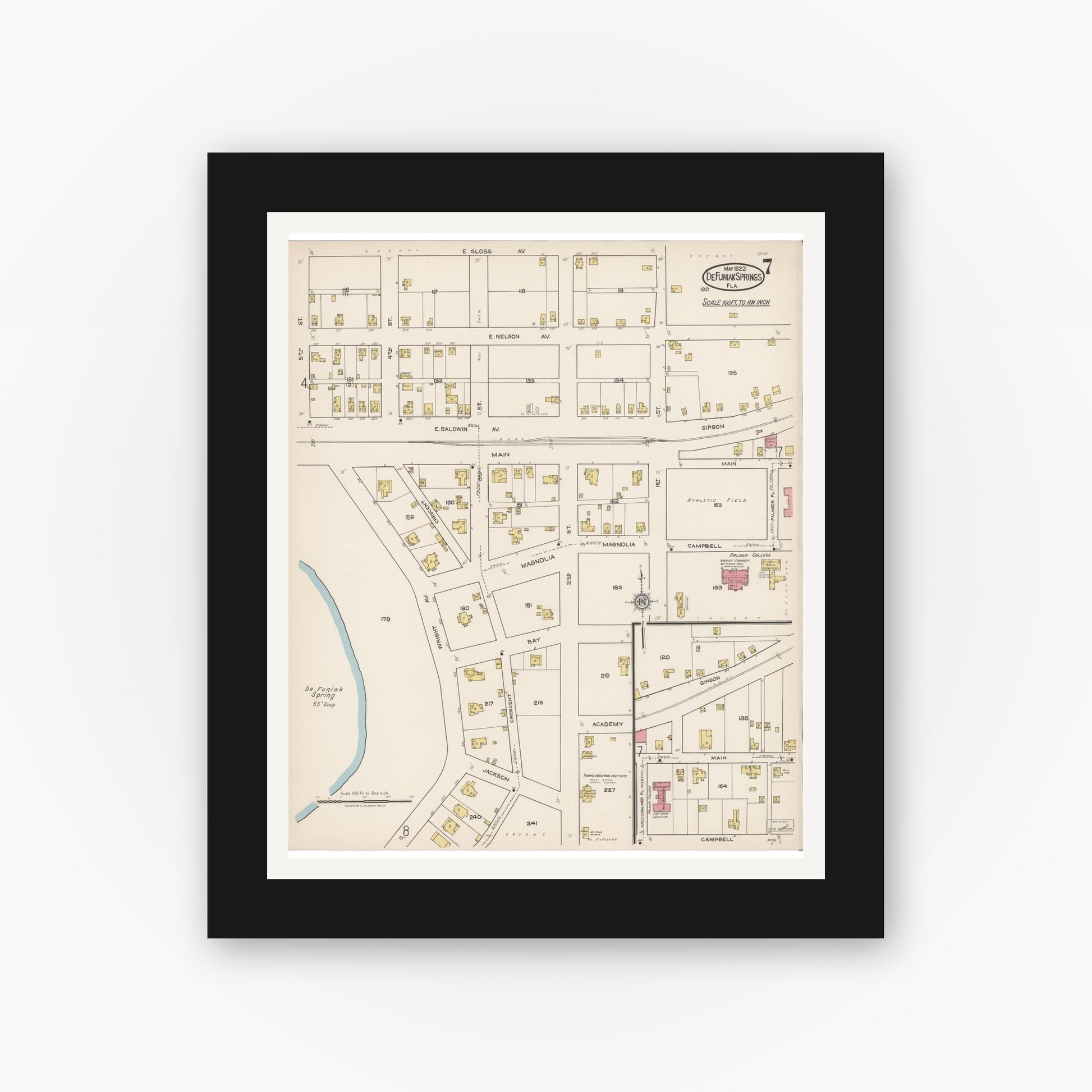 Old map wall art mockup — black gallery frame with white mat — Sanborn Fire Insurance Map from De Funiak Springs, Walton County, Florida (1922), Sheet #0007