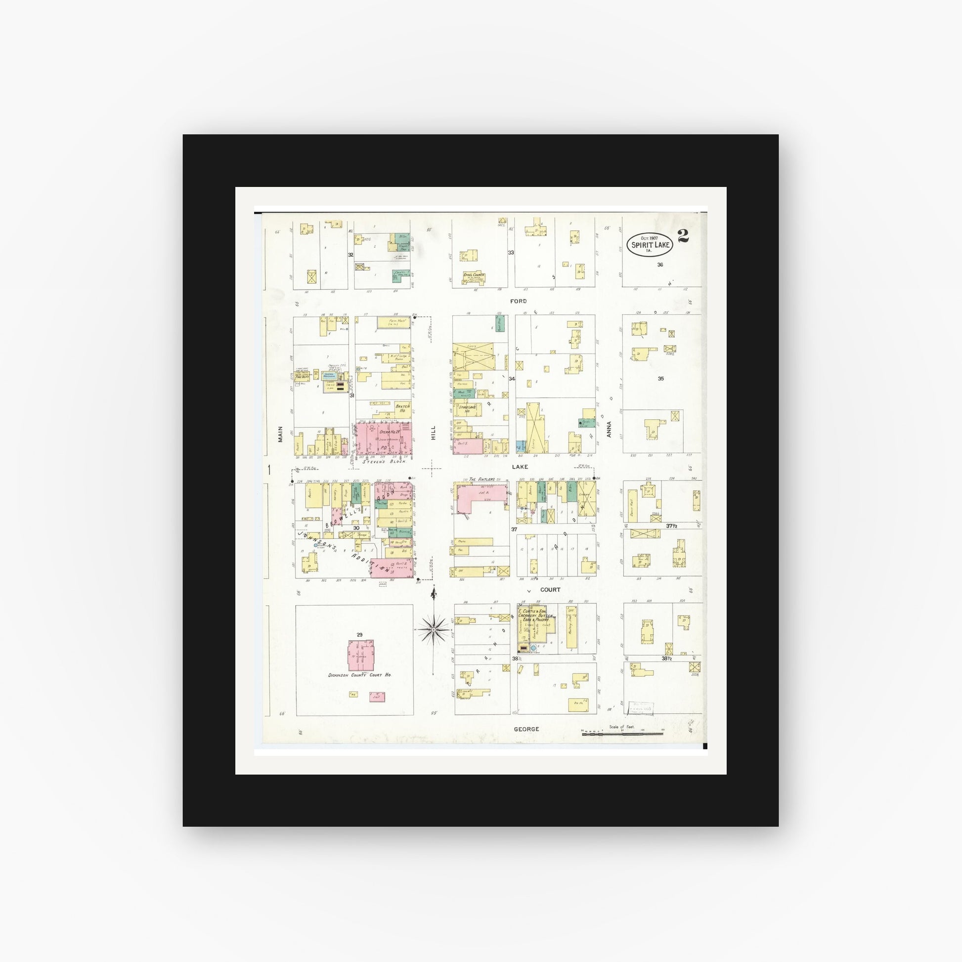 Old map wall art mockup — black gallery frame with white mat — Sanborn Fire Insurance Map from Spirit Lake, Dickinson County, Iowa (1907), Sheet #0002
