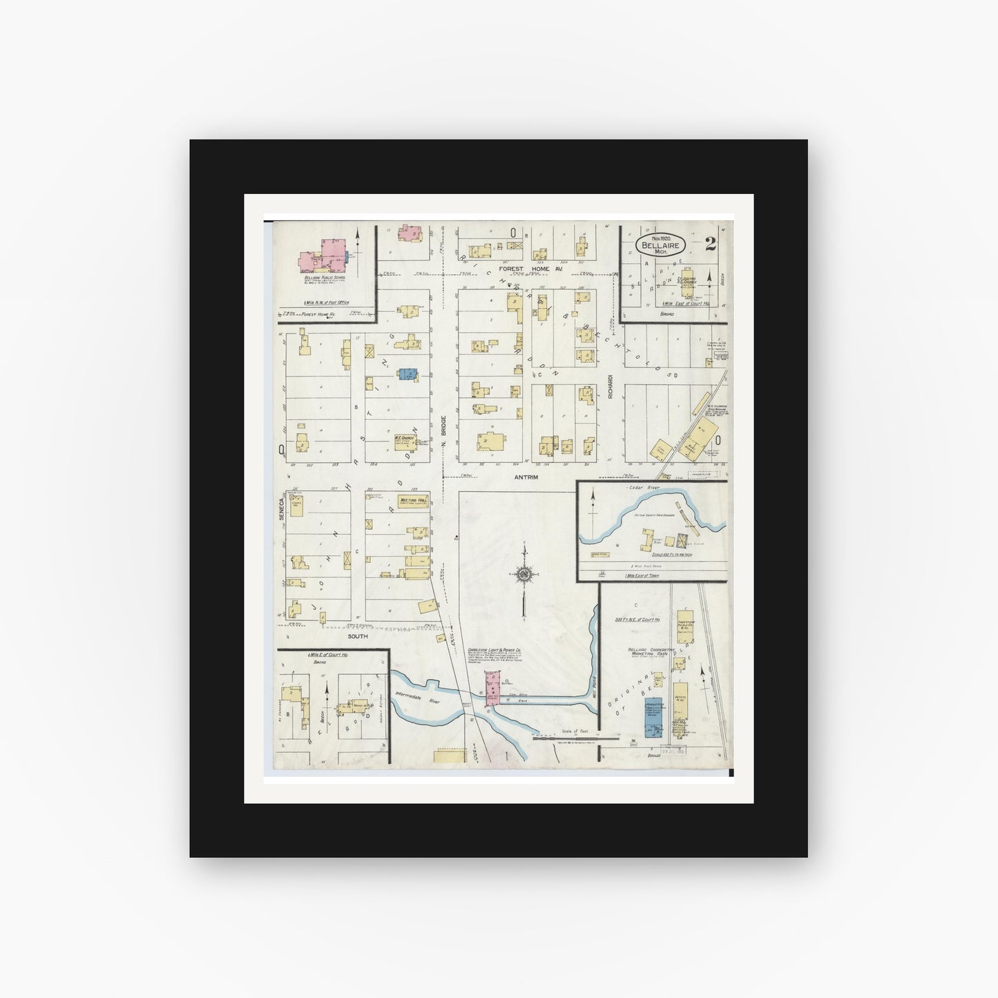 Old map wall art mockup — black gallery frame with white mat — Sanborn Fire Insurance Map from Bellaire, Antrim County, Michigan (1920), Sheet #0002