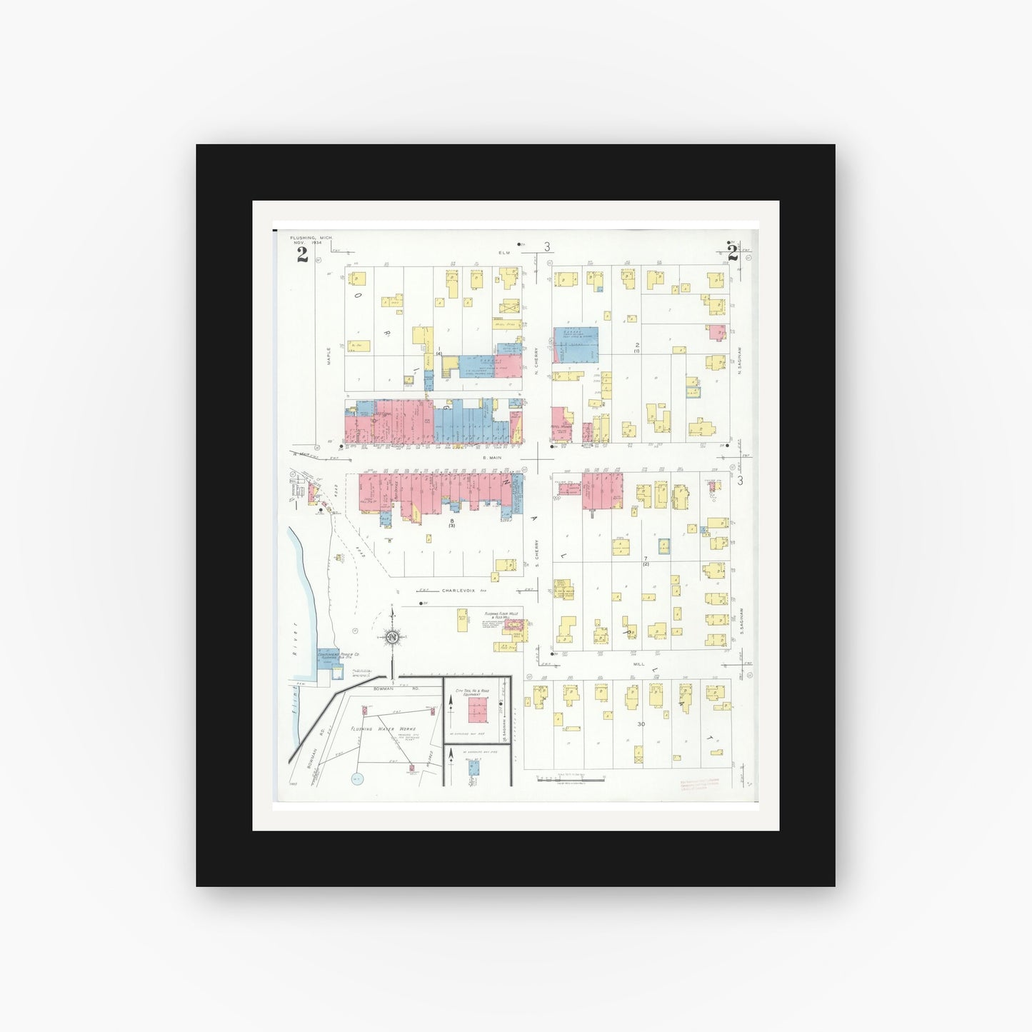 Old map wall art mockup — black gallery frame with white mat — Sanborn Fire Insurance Map from Flushing, Genesee County, Michigan (1934), Sheet #0002