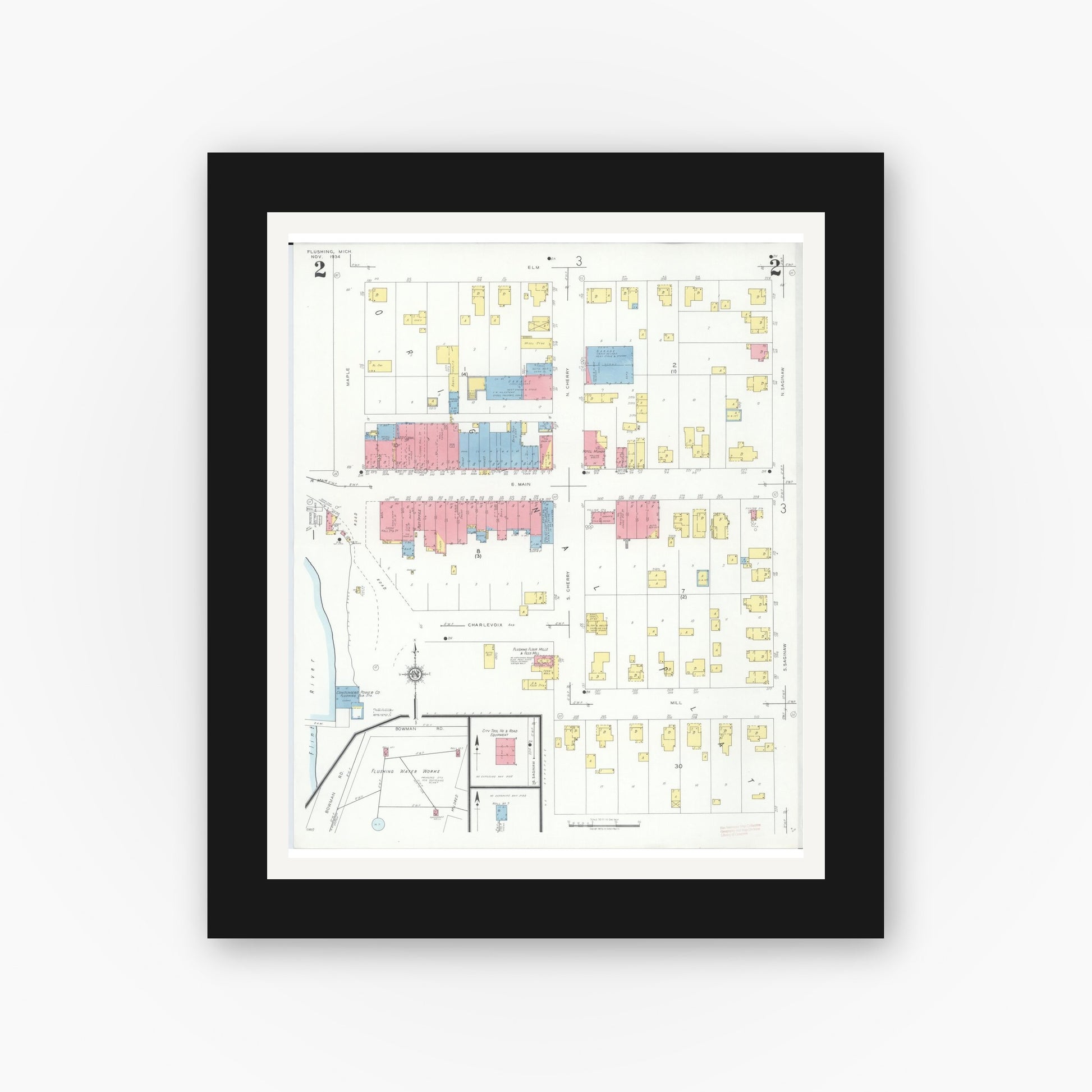 Old map wall art mockup — black gallery frame with white mat — Sanborn Fire Insurance Map from Flushing, Genesee County, Michigan (1934), Sheet #0002