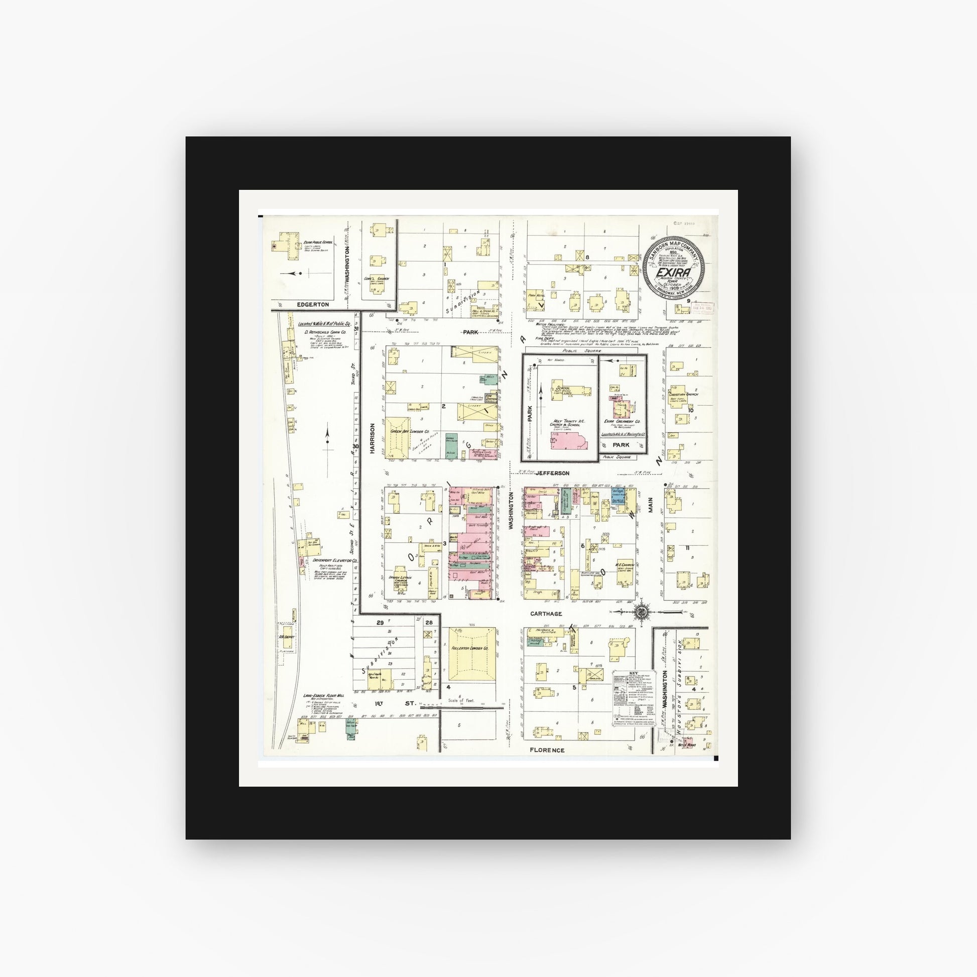 Old map wall art mockup — black gallery frame with white mat — Sanborn Fire Insurance Map from Exira, Audubon County, Iowa (1909), Sheet #0001