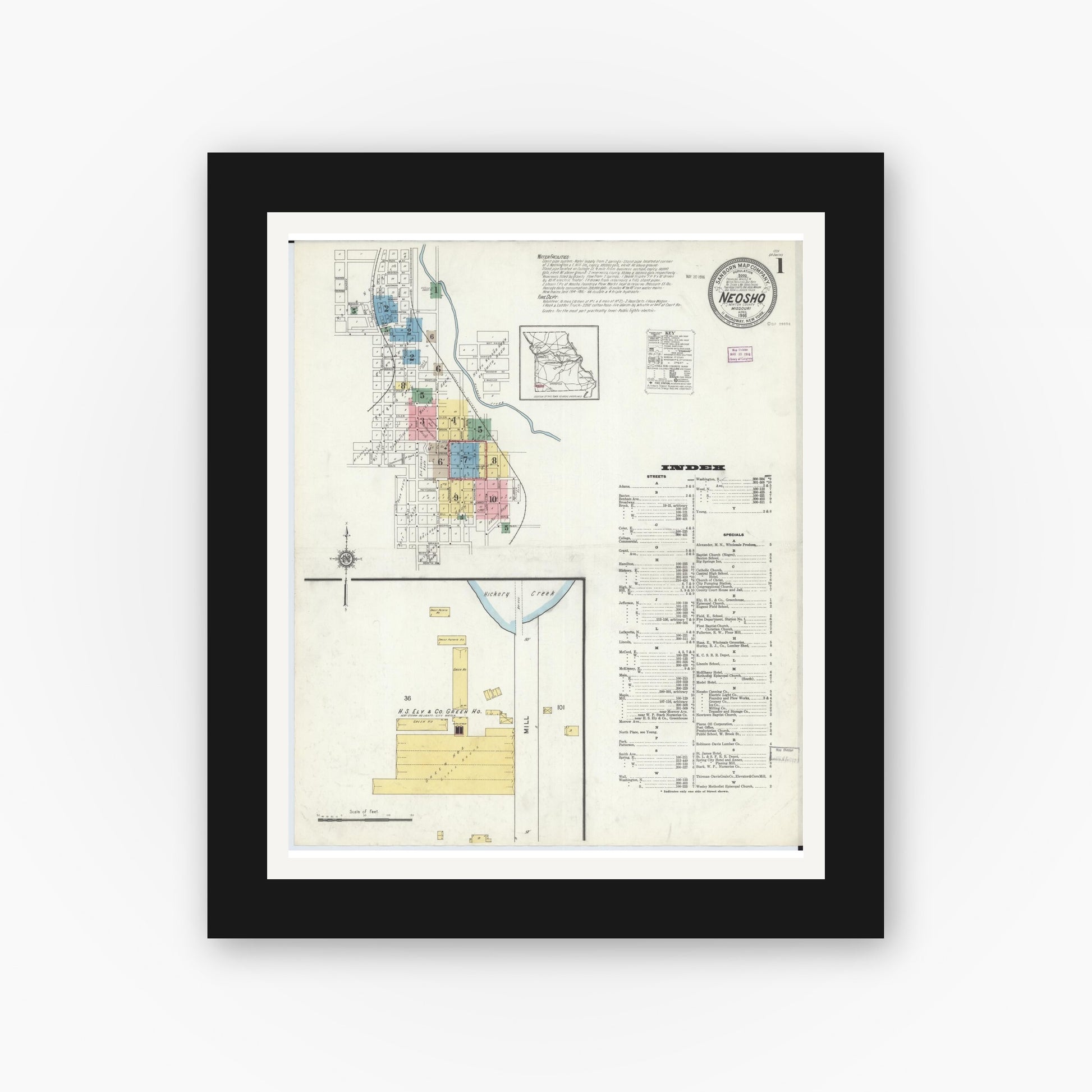 Old map wall art mockup — black gallery frame with white mat — Sanborn Fire Insurance Map from Neosho, Newton County, Missouri (1916) - Complete Map Set