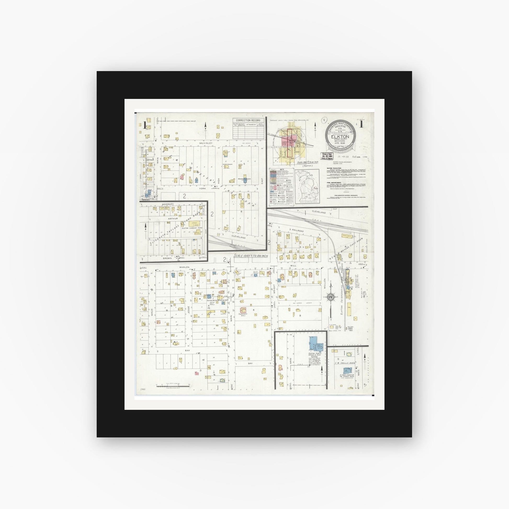 Old map wall art mockup — black gallery frame with white mat — Sanborn Fire Insurance Map from Elkton, Huron County, Michigan (1938), Sheet #0001