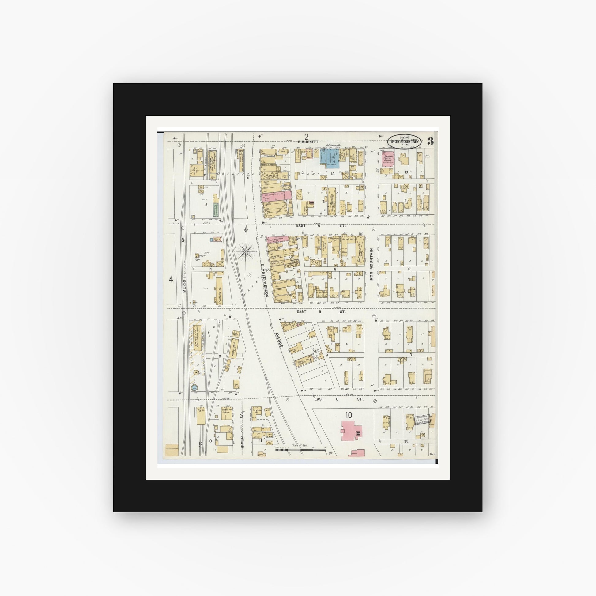 Old map wall art mockup — black gallery frame with white mat — Sanborn Fire Insurance Map from Iron Mountain, Dickinson County, Michigan (1897), Sheet #0003