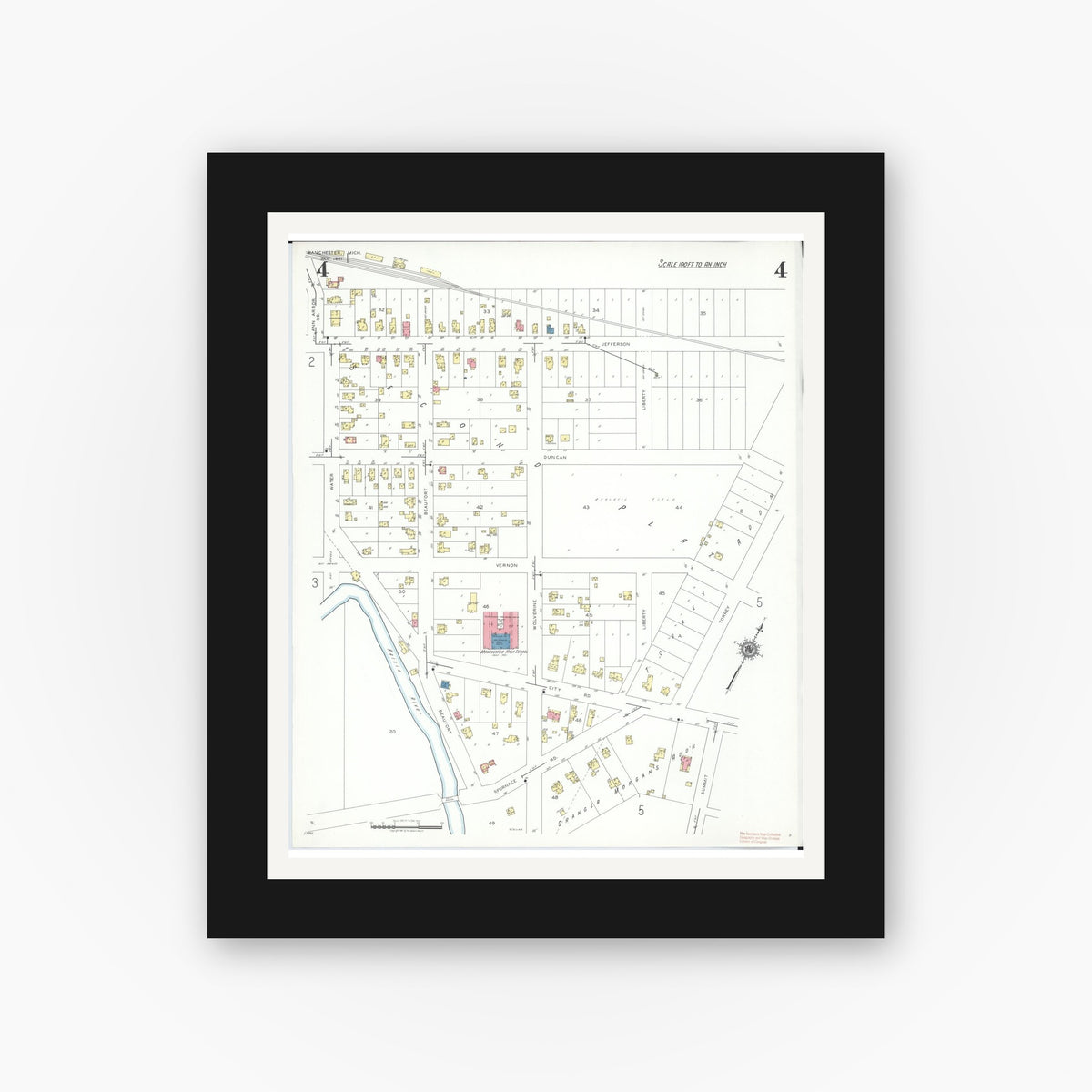 Old map wall art mockup — black gallery frame with white mat — Sanborn Fire Insurance Map from Manchester, Washtenaw County, Michigan (1941), Sheet #0004