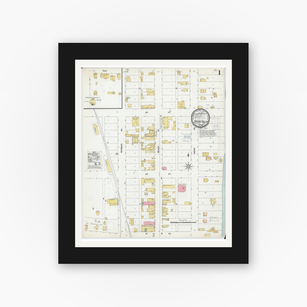 Old map wall art mockup — black gallery frame with white mat — Sanborn Fire Insurance Map from Spring Valley, Pierce County, Wisconsin (1900), Sheet #0001