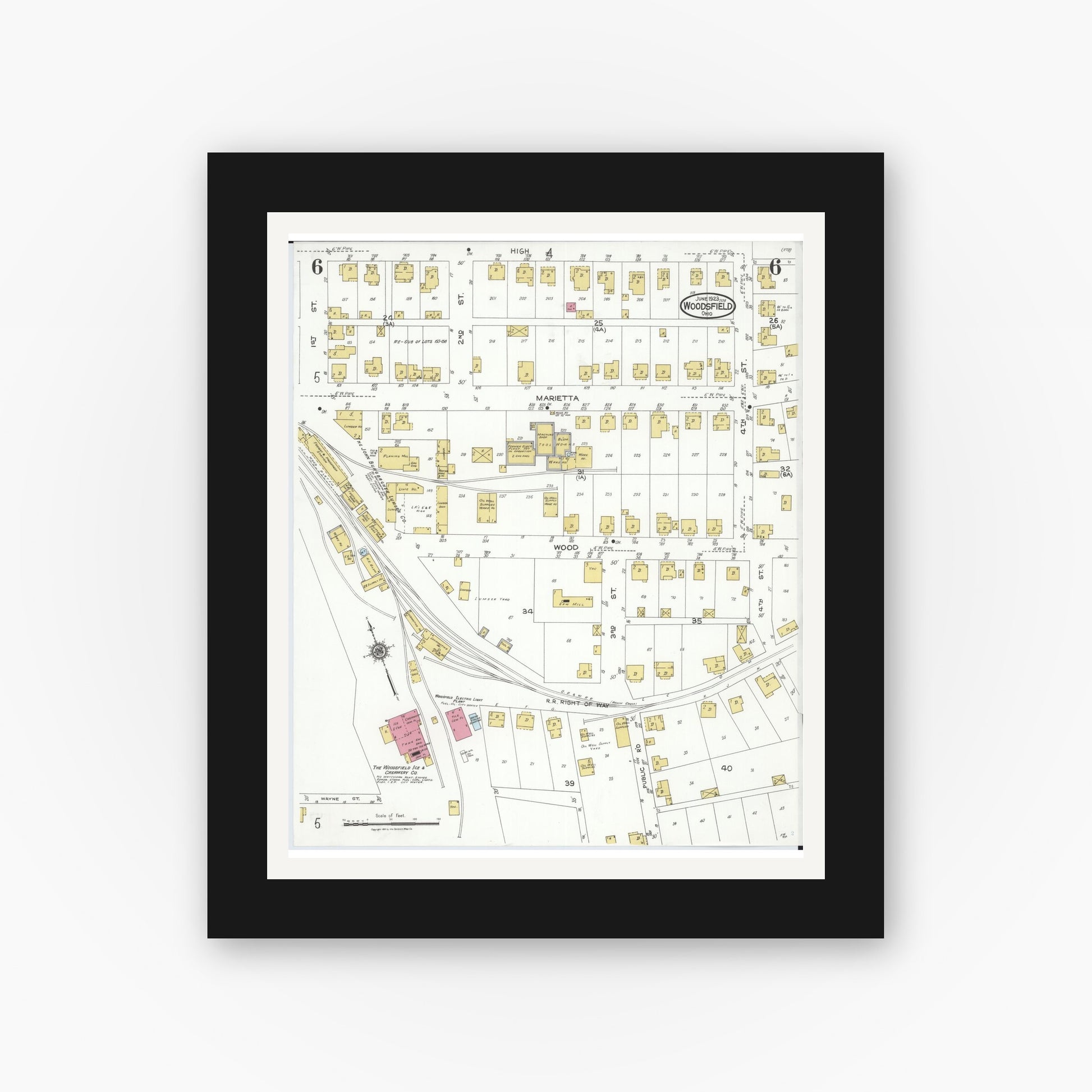 Old map wall art mockup — black gallery frame with white mat — Sanborn Fire Insurance Map from Woodsfield, Monroe County, Ohio (1923), Sheet #0006
