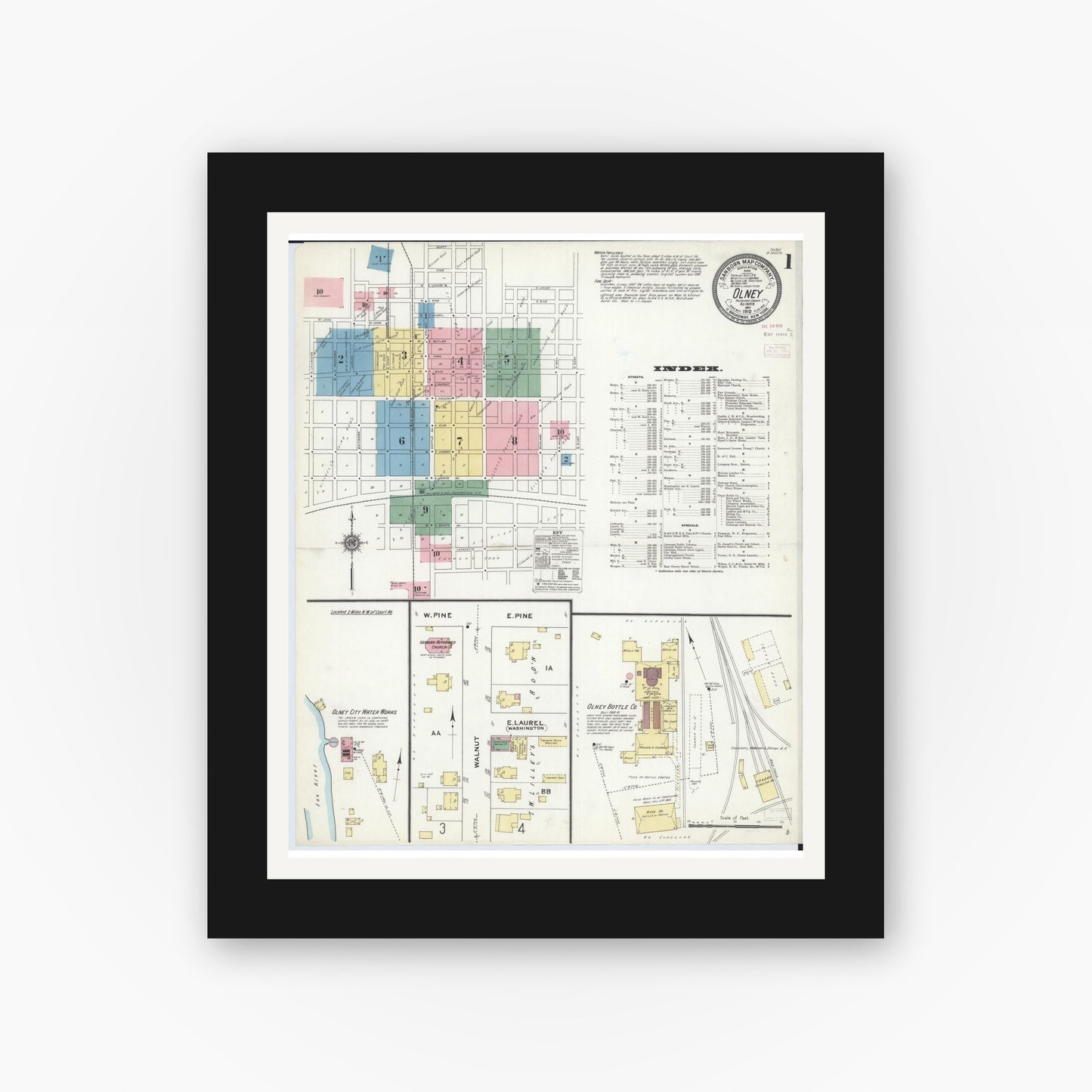 Old map wall art mockup — black gallery frame with white mat — Sanborn Fire Insurance Map from Olney, Richland County, Illinois (1910) - Complete Map Set