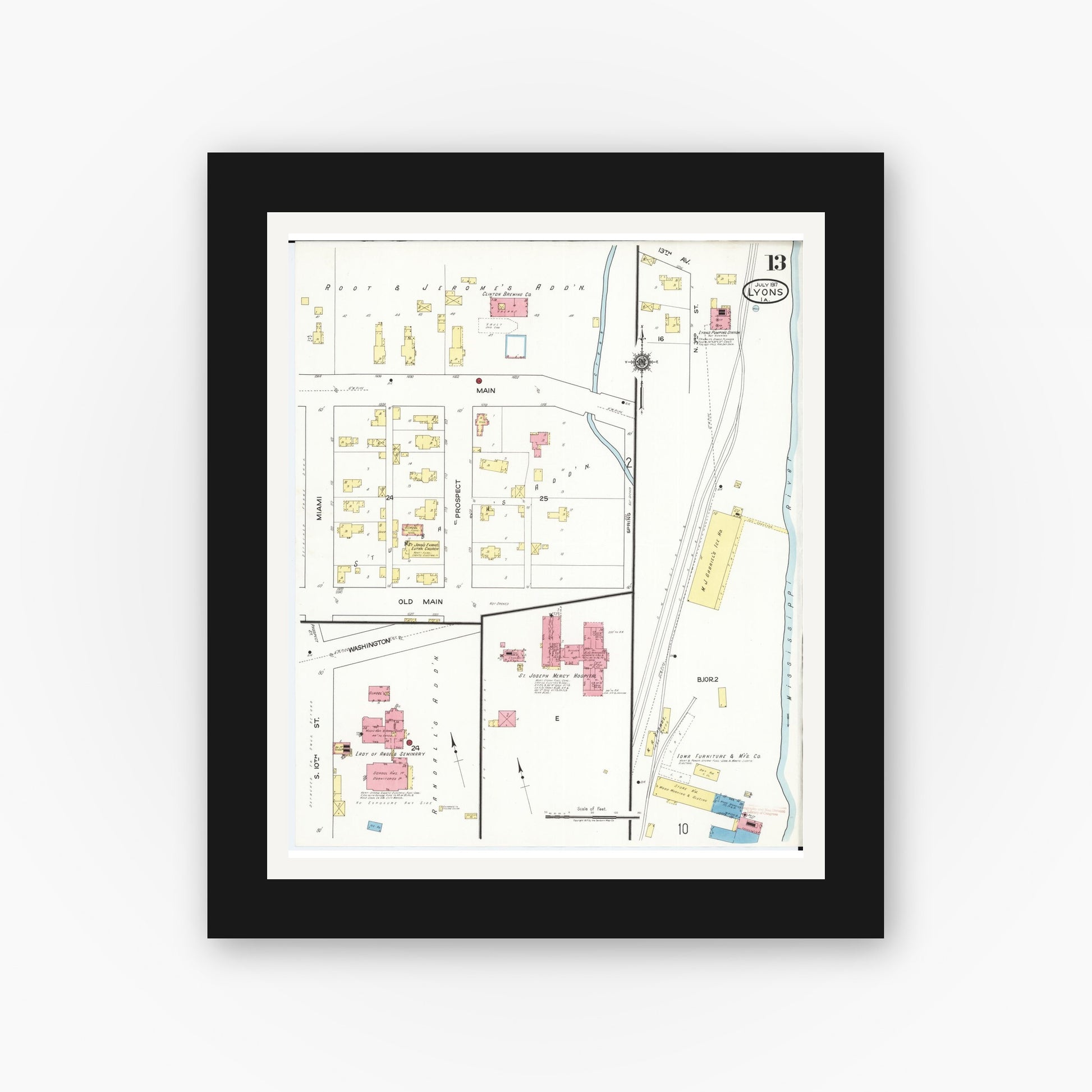 Old map wall art mockup — black gallery frame with white mat — Sanborn Fire Insurance Map from Lyons, Clinton County, Iowa (1917), Sheet #0013