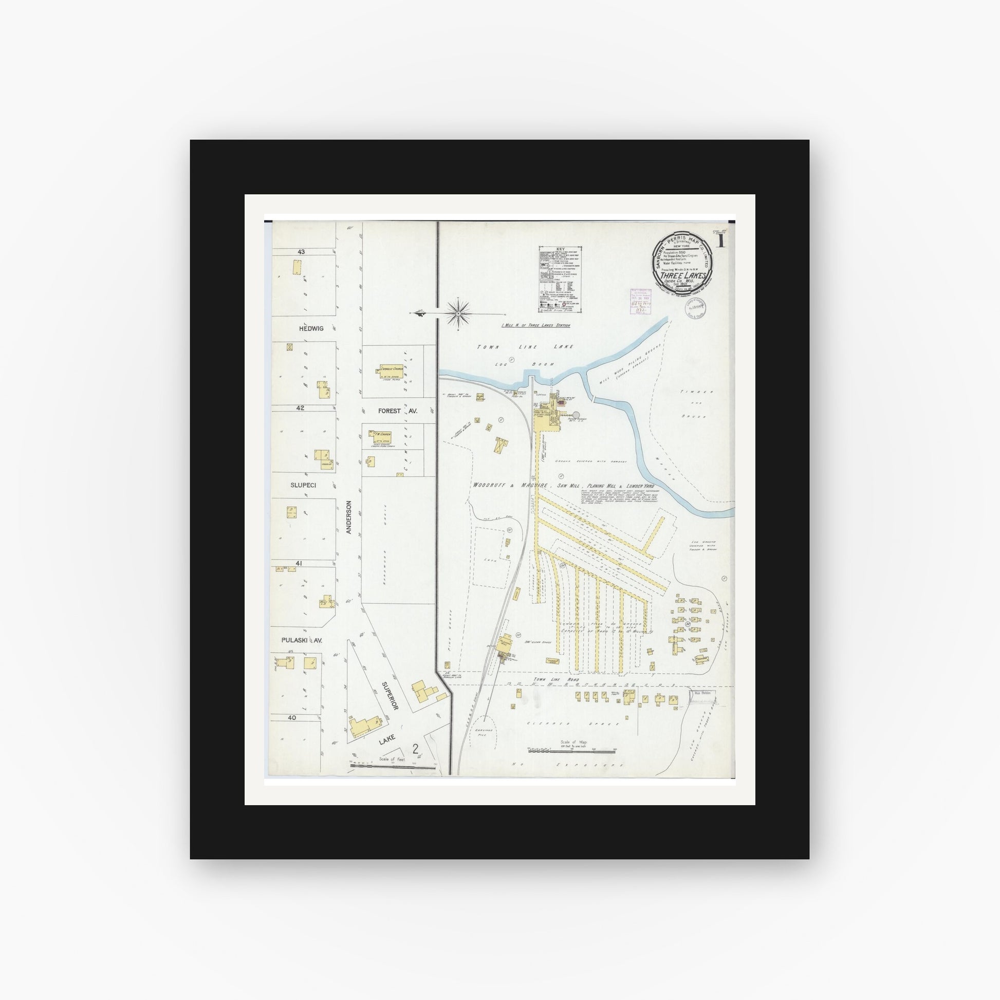 Old map wall art mockup — black gallery frame with white mat — Sanborn Fire Insurance Map from Three Lakes, Oneida County, Wisconsin (1901), Sheet #0001