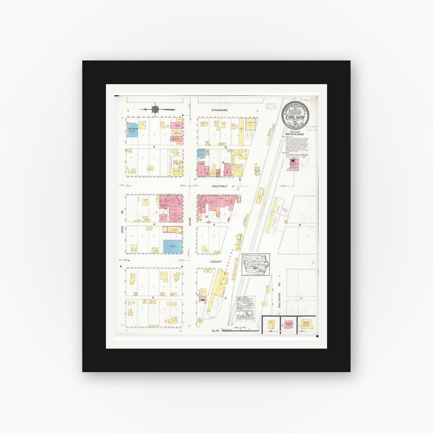 Old map wall art mockup — black gallery frame with white mat — Sanborn Fire Insurance Map from Earlham, Madison County, Iowa (1916), Sheet #0001